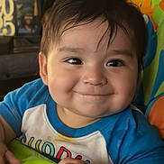 Parker joined the competition — help win amazing prizes! baby, child, smiling, face, hand, blue_shirt, green_tray, high_chair, indoor, cute, portrait, infant, happy, person, toddler, furniture, home, colorful, young_child, closeup