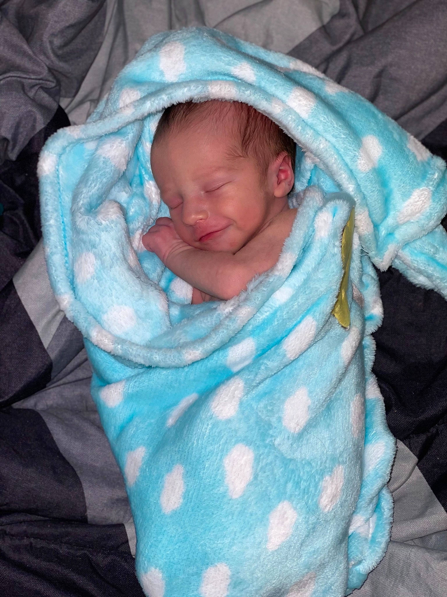 Kye is registered to the contest to win money with this photo: baby, baby_products, baby_sleeping, baby_toddler_clothing, bedtime, cheek, child, comfort, electric_blue, event, infant_bed, iris, linens, mammal, nap, pattern, person, room, textile, thumb