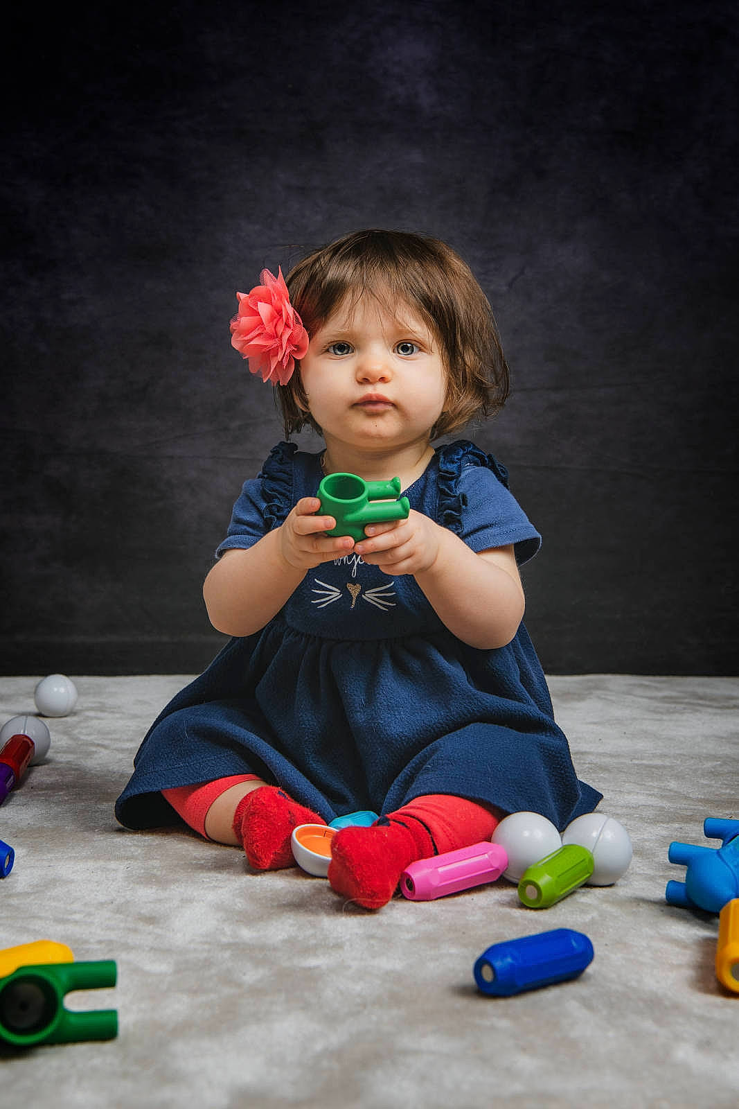 Genevieve participe au concours pour gagner de l'argent avec cette photo : baby, baby_playing_with_toys, baby_toddler_clothing, baby_toys, child, event, face, flash_photography, flooring, fun, happy, leisure, person, play, portrait_photography, room, sitting, skin, toddler, toy