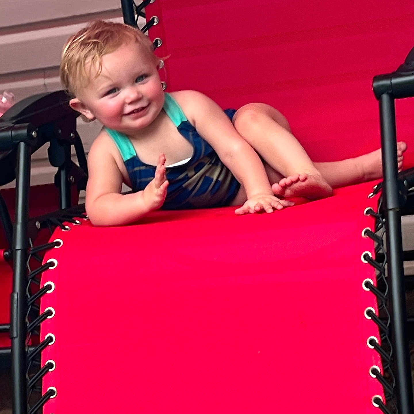 Vivian joined the competition — help win amazing prizes! armchair, baby, bodypart, chair, clothing, cushion, dress, face, finger, furniture, hand, head, homedecor, outdoors, person, photography, playarea, portrait, sitting, swimwear