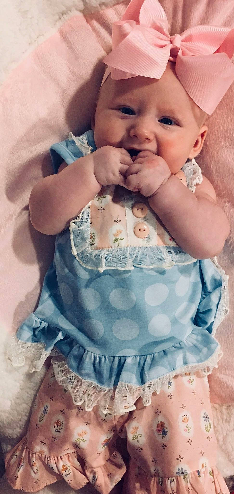 Presleigh is registered to the contest to win money with this photo: abdomen, baby, baby_products, baby_toddler_clothing, cheek, child, facial_expression, forehead, hand, head, joy, mouth, neck, nose, person, pink, product, skin, smile, toddler