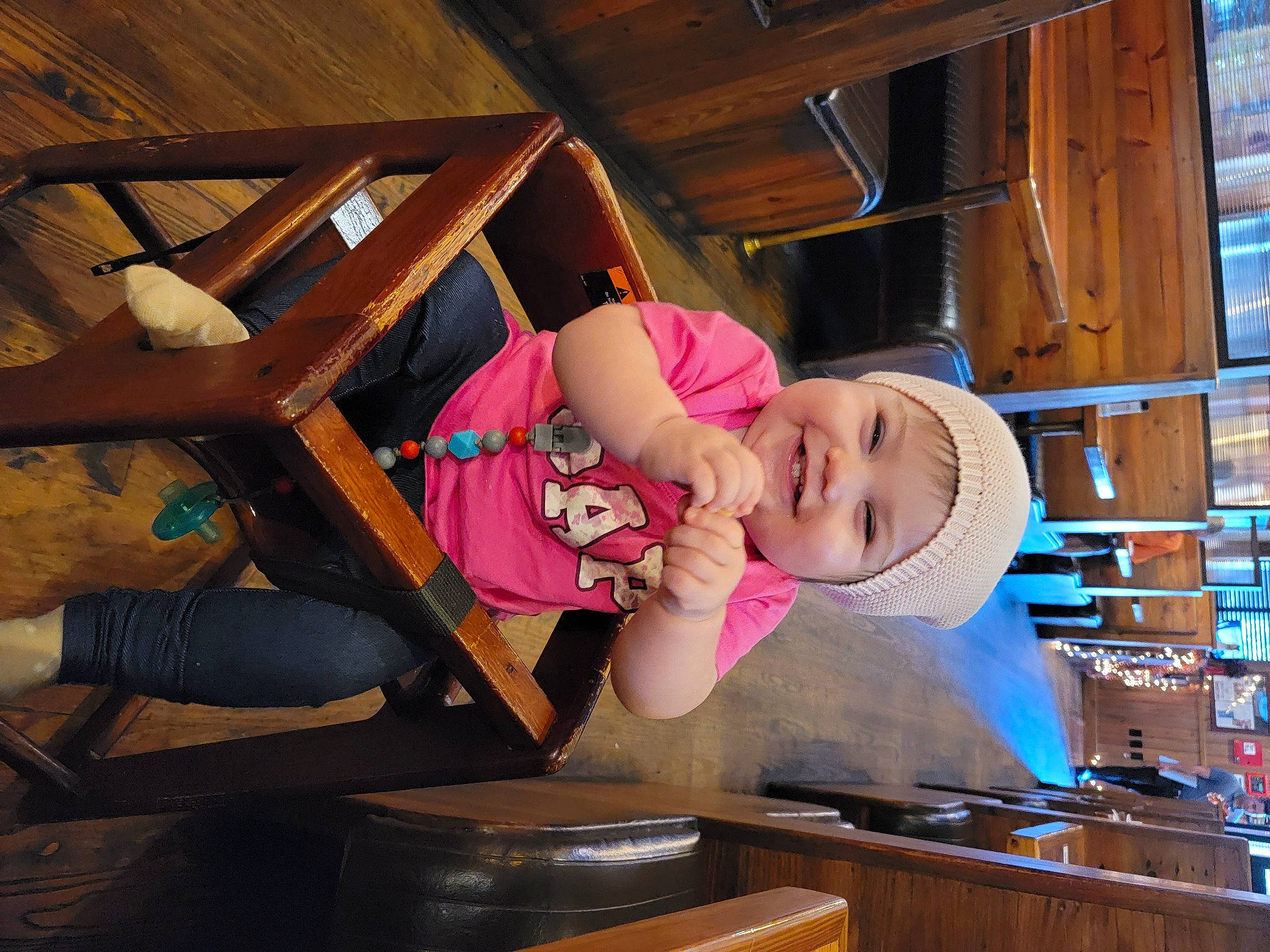Billie is registered to the contest to win money with this photo: baby, baby_toddler_clothing, building, child, comfort, cooking, fun, hardwood, hat, headwear, joy, leisure, lumber, person, product, room, sitting, toddler, vacation, wood