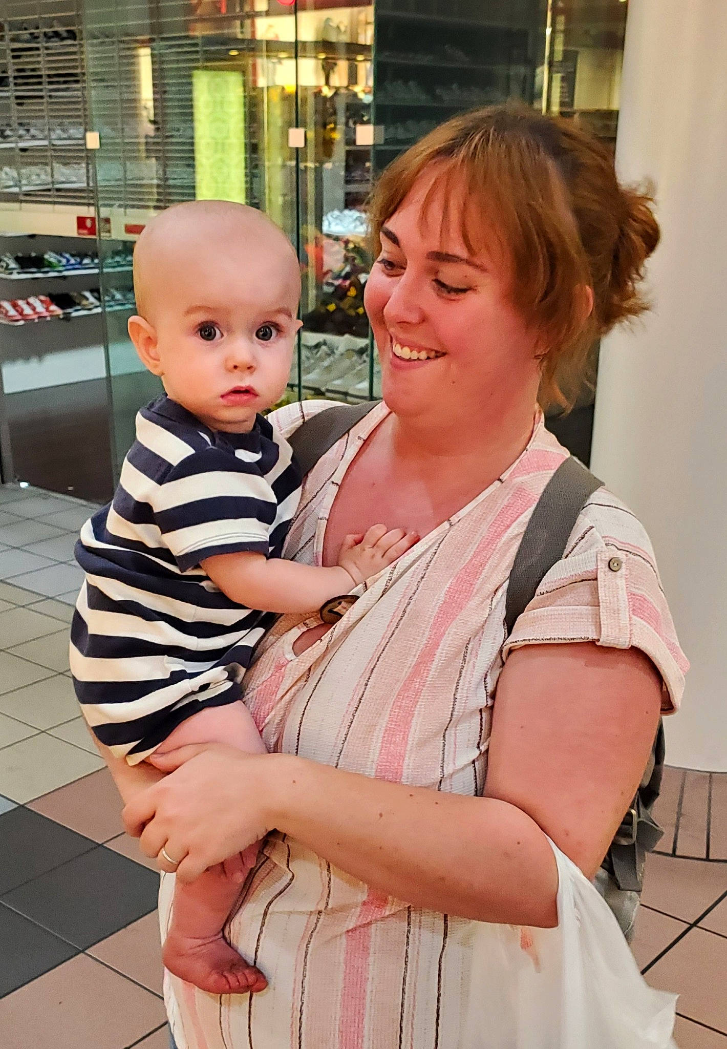 Orion is registered to the contest to win money with this photo: baby, baby_toddler_clothing, child, event, fashion_design, flooring, fun, hairstyle, happy, jewellery, joy, laugh, pattern, peach, person, shoulder, sitting, skin, smile, surprise