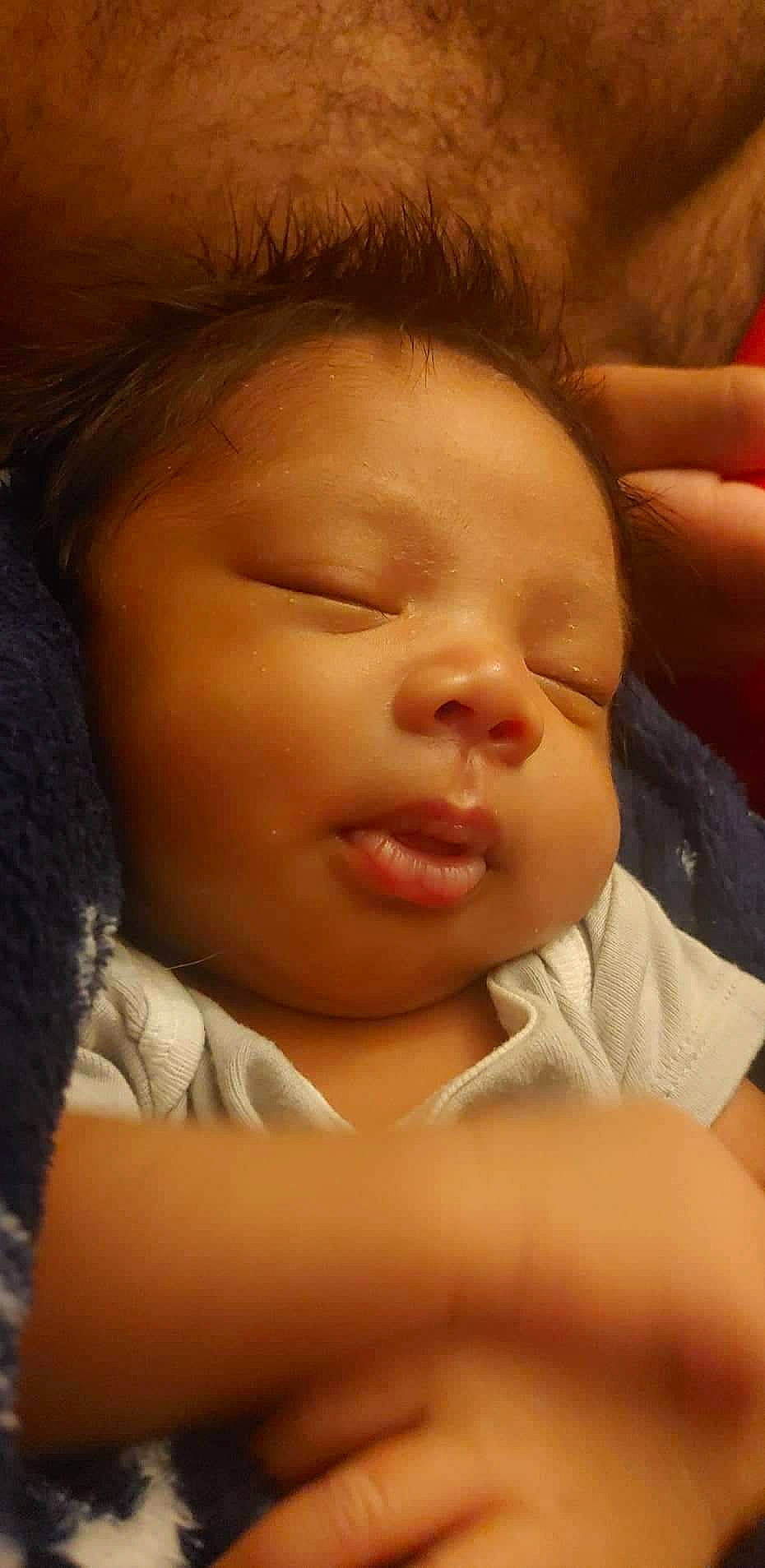 Cewmonie is registered to the contest to win money with this photo: baby, baby_toddler_clothing, bedtime, cheek, child, chin, close_up, comfort, ear, eyebrow, eyelash, forehead, happy, iris, lip, mouth, nose, person, skin, thumb