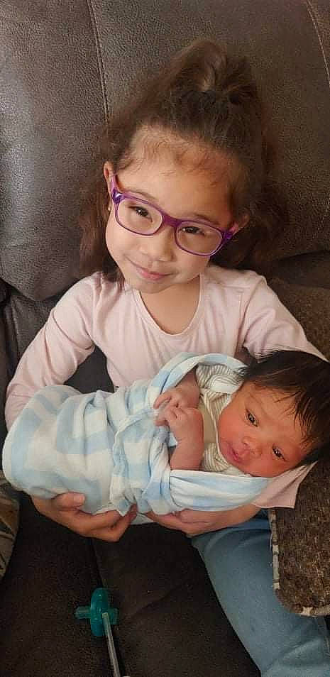 Cewmonie is registered to the contest to win money with this photo: arm, baby_toddler_clothing, cheek, chin, comfort, ear, eye, eyebrow, face, glasses, hair, head, human_body, iris, joy, lip, mouth, nose, person, skin