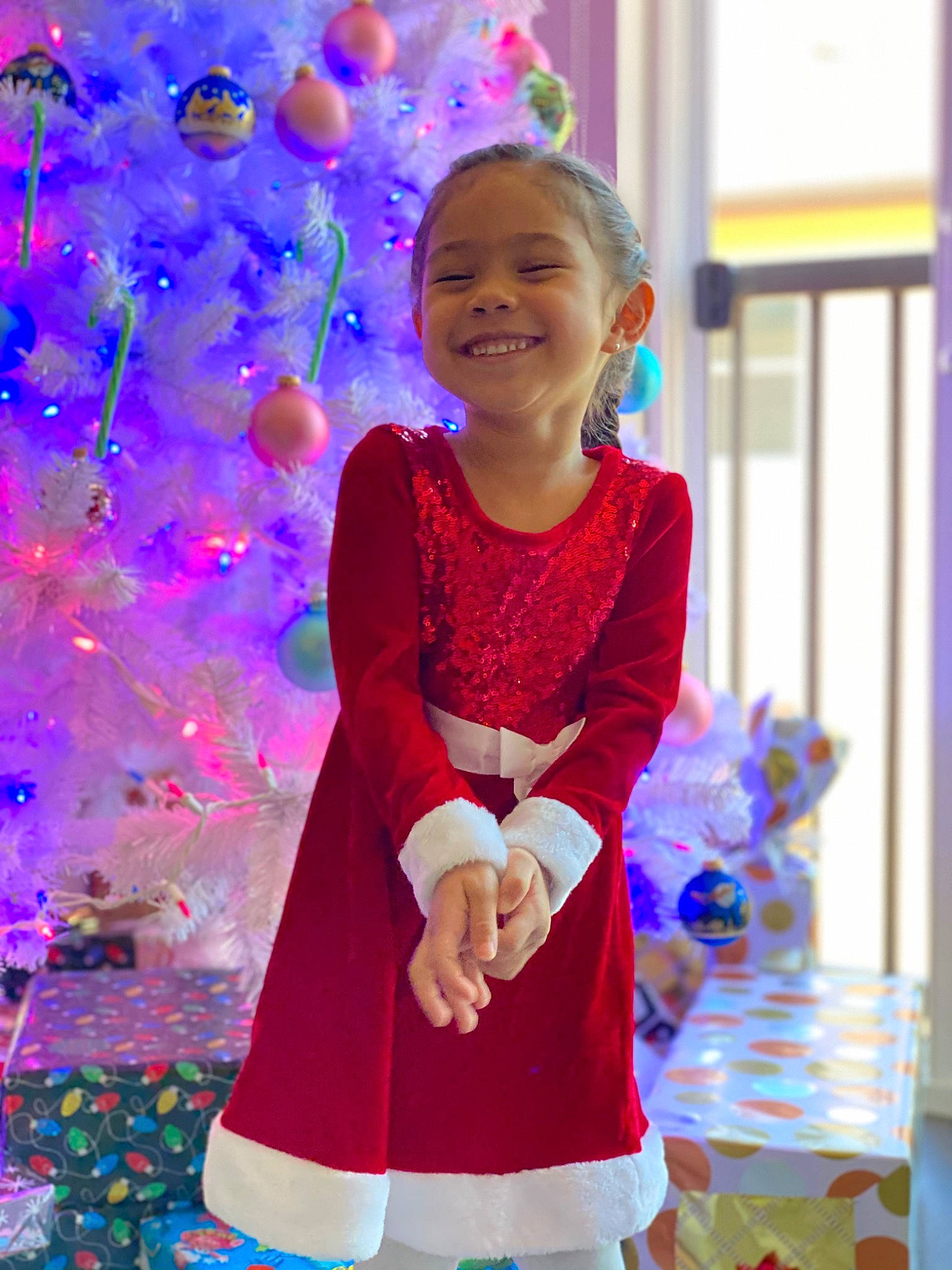 Kairi is registered to the contest to win money with this photo: baby_toddler_clothing, blue, christmas_decoration, christmas_ornament, christmas_tree, dress, electric_blue, event, fun, happy, holiday_ornament, joy, magenta, ornament, person, pink, plant, purple, sleeve, smile