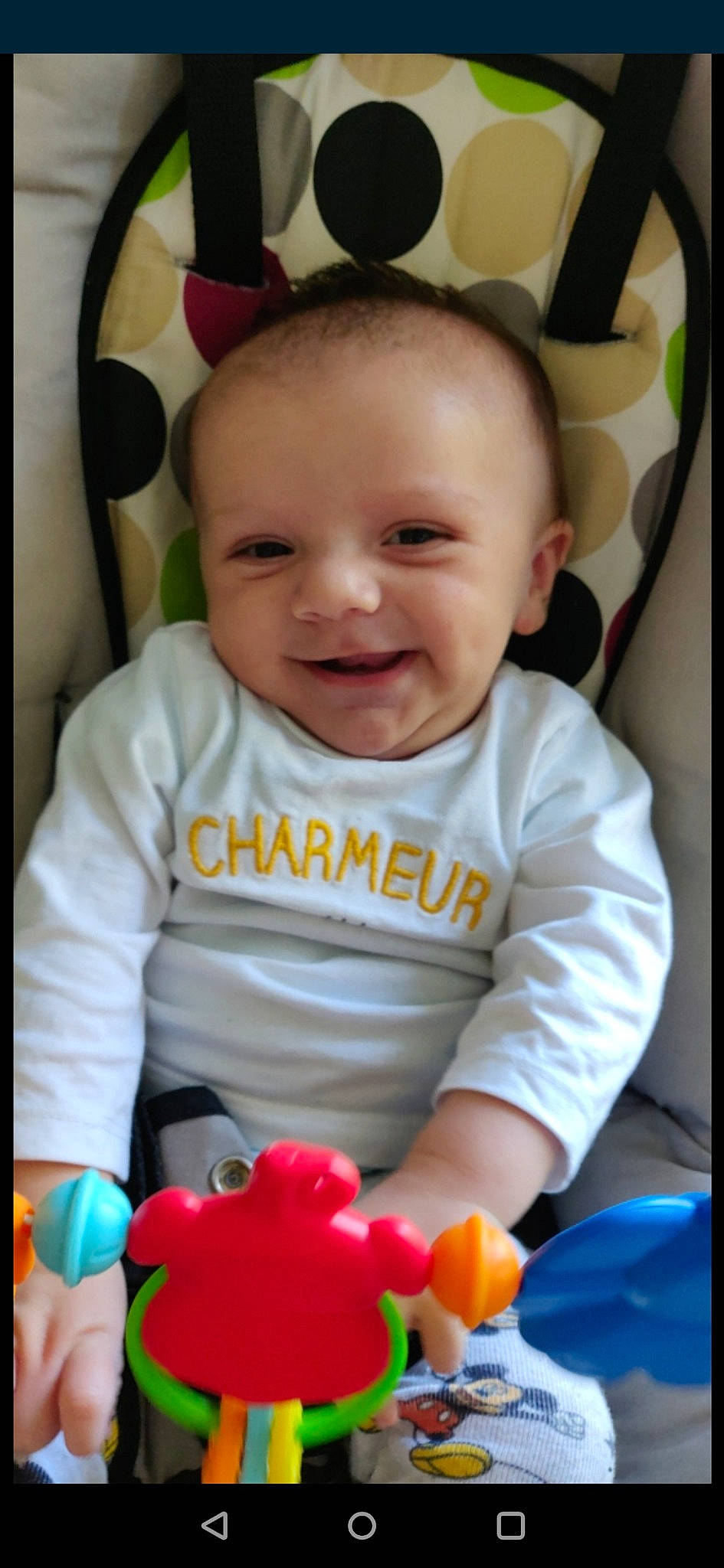 Gabriel participe au concours pour gagner de l'argent avec cette photo : baby, baby_playing_with_toys, baby_products, baby_toys, cheek, child, eye, finger, joy, lip, nose, person, play, product, skin, smile, toddler, toy