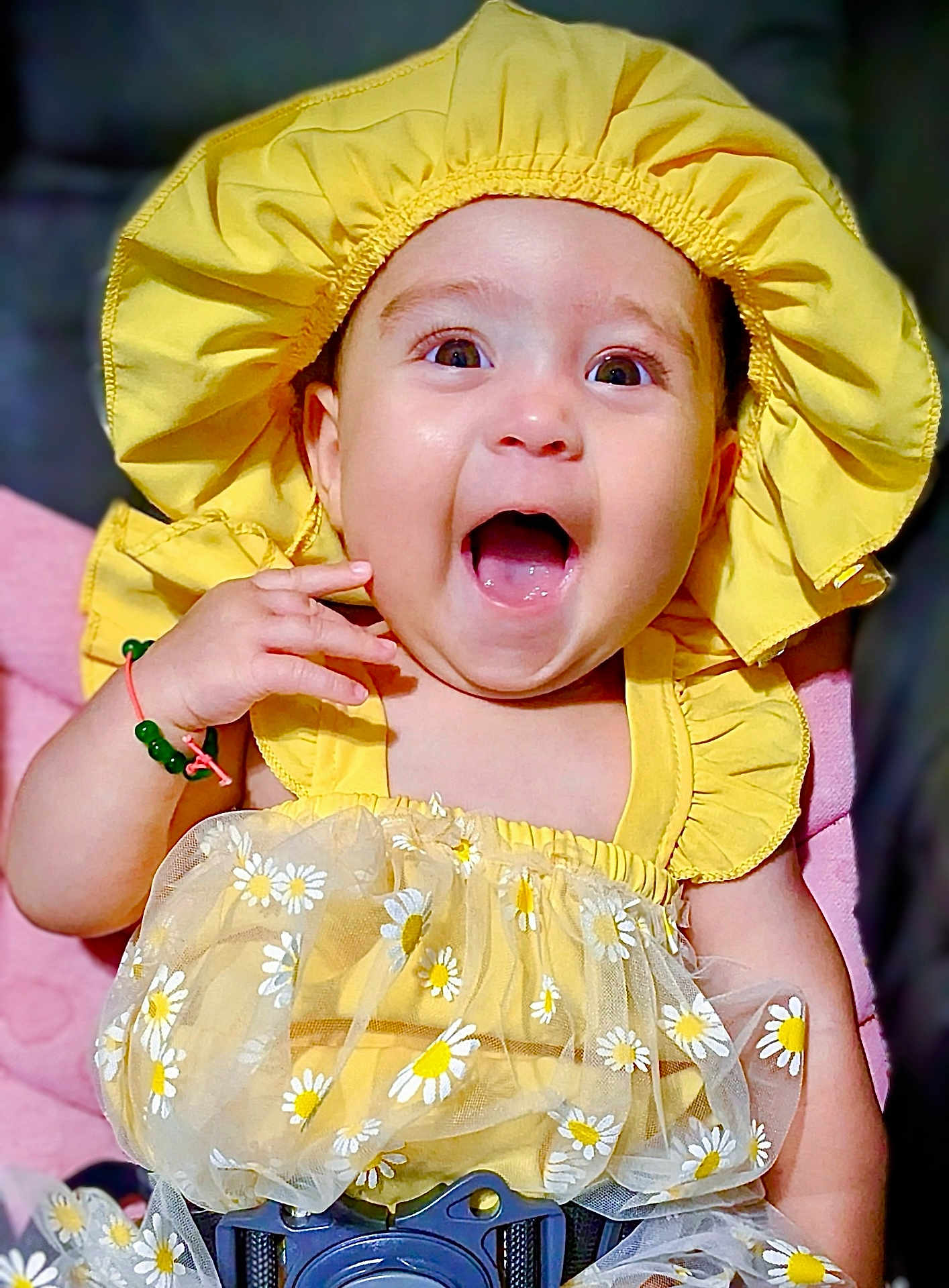 Serenity joined the competition — help win amazing prizes! baby, child, yellow_clothing, bonnet, smiling, happy, tutu, floral_pattern, cute, infant, portrait, sitting, bracelet, hand, face, bright_colors, cheerful, cute_outfit, closeup, adorable