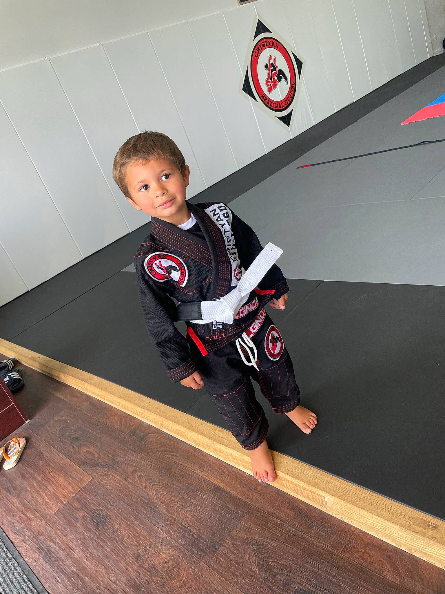 Kyree joined the competition — help win amazing prizes! competition_event, elbow, floor, flooring, hardwood, jersey, joy, knee, logo, person, player, recreation, sleeve, sports, sports_equipment, sports_uniform, sportswear, sweatpant, t_shirt, uniform