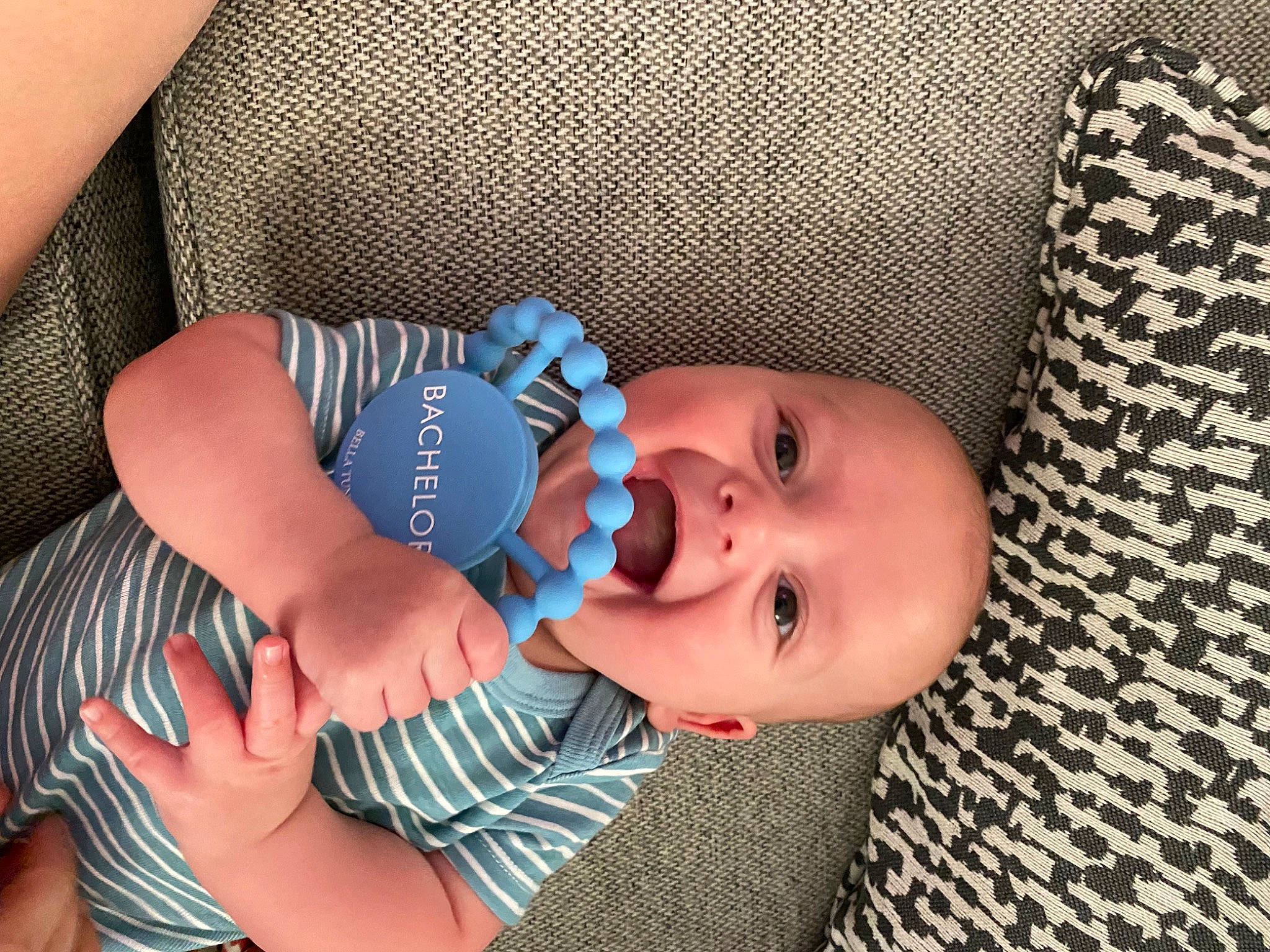 Beau joined the competition — help win amazing prizes! baby, baby_products, baby_toddler_clothing, cheek, child, comfort, elbow, electric_blue, hand, hat, headgear, human_body, nail, pattern, person, skin, sleeve, smile, sun_hat, textile