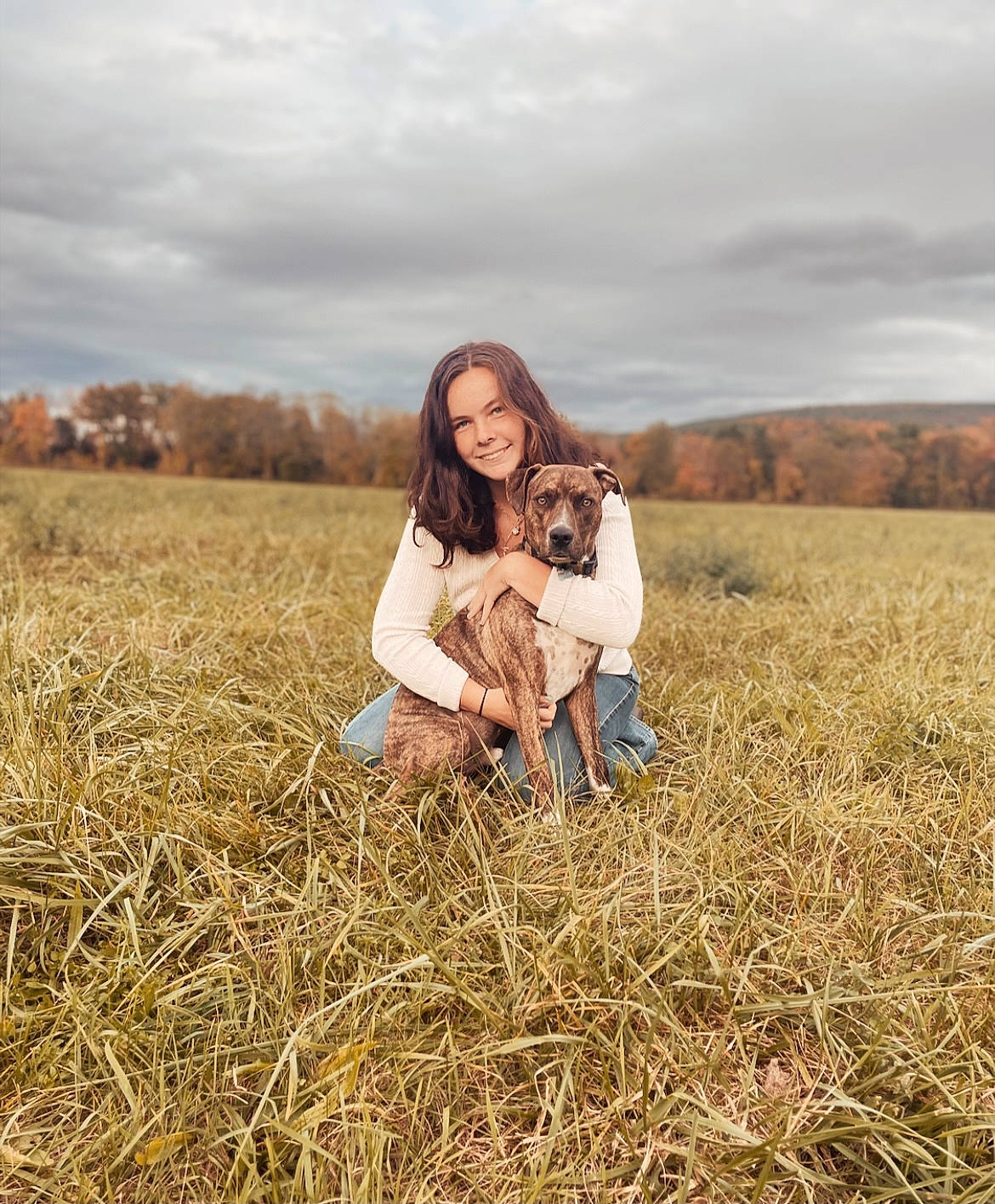 Baylor is registered to the contest to win money with this photo: agriculture, blond, clothing, cloud, fawn, flash_photography, grass, grassland, happy, landscape, meadow, natural_landscape, people_in_nature, plain, plant, prairie, sky, sunlight, tree, wood