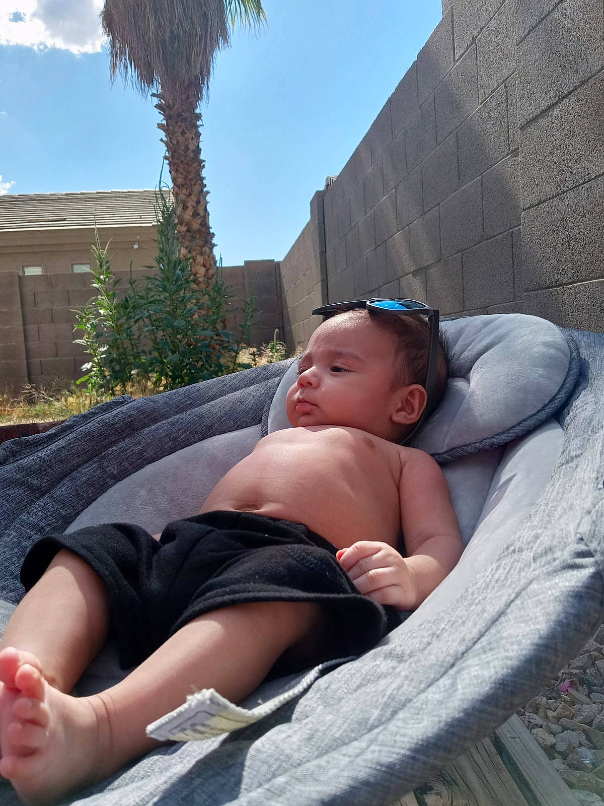Sergio joined the competition — help win amazing prizes! abdomen, baby, barechested, barefoot, cloud, comfort, foot, fun, grass, hat, human_leg, knee, leg, leisure, person, plant, sky, thigh, toddler, tree