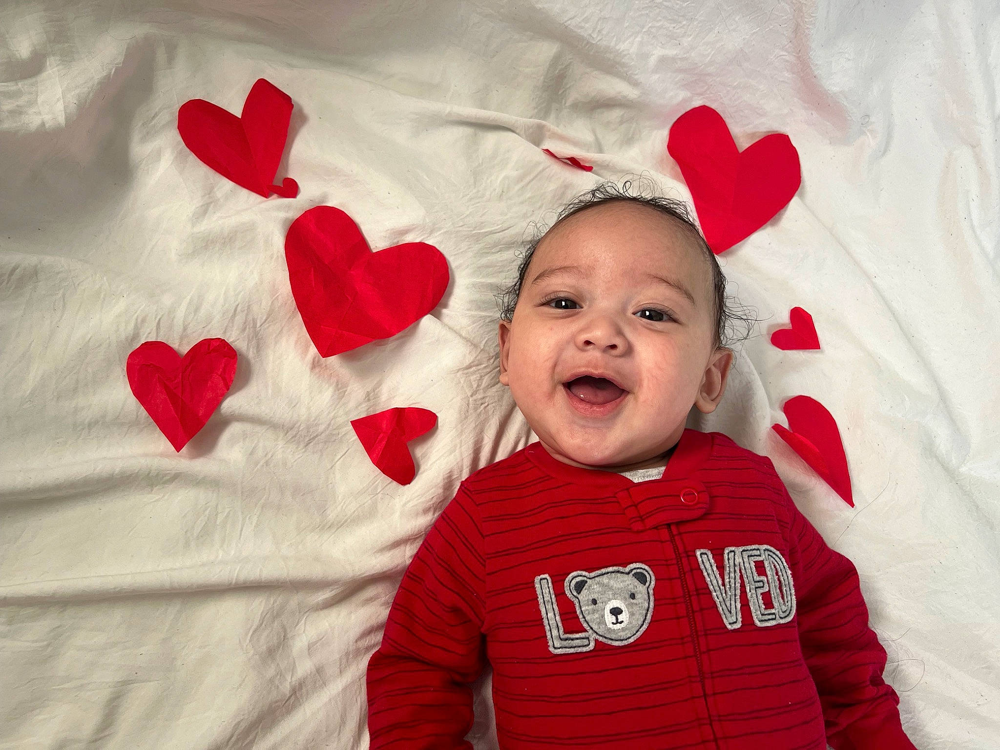 Derrick joined the competition — help win amazing prizes! baby, baby_toddler_clothing, carmine, child, comfort, event, happy, insect, linens, love, pattern, person, pink, red, room, sleeve, smile, t_shirt, textile, toddler