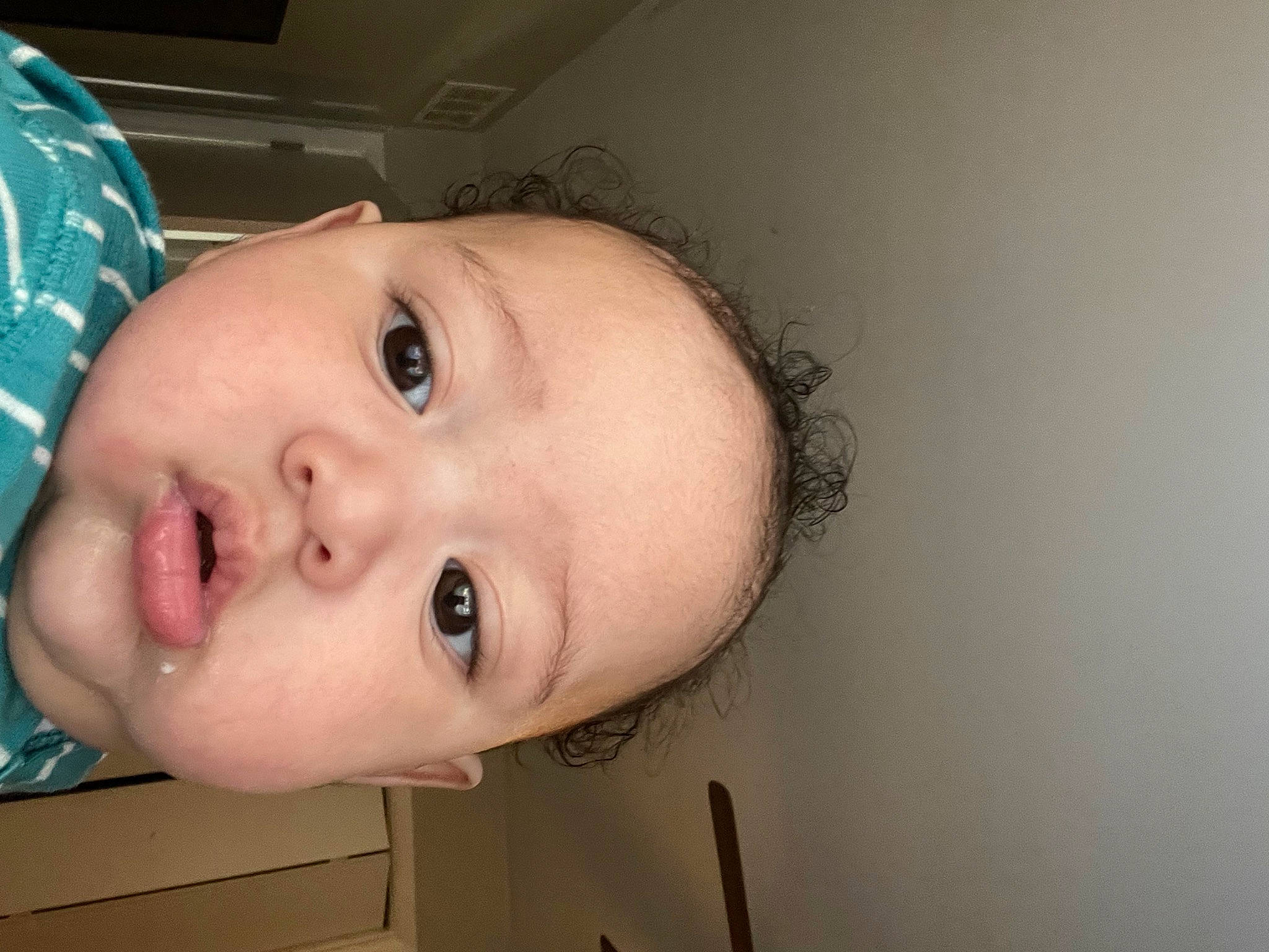 Derrick is registered to the contest to win money with this photo: baby, baby_toddler_clothing, cheek, chest, child, ear, eye, eyelash, forehead, fun, happy, iris, jaw, lip, neck, nose, person, smile, sorrow, throat