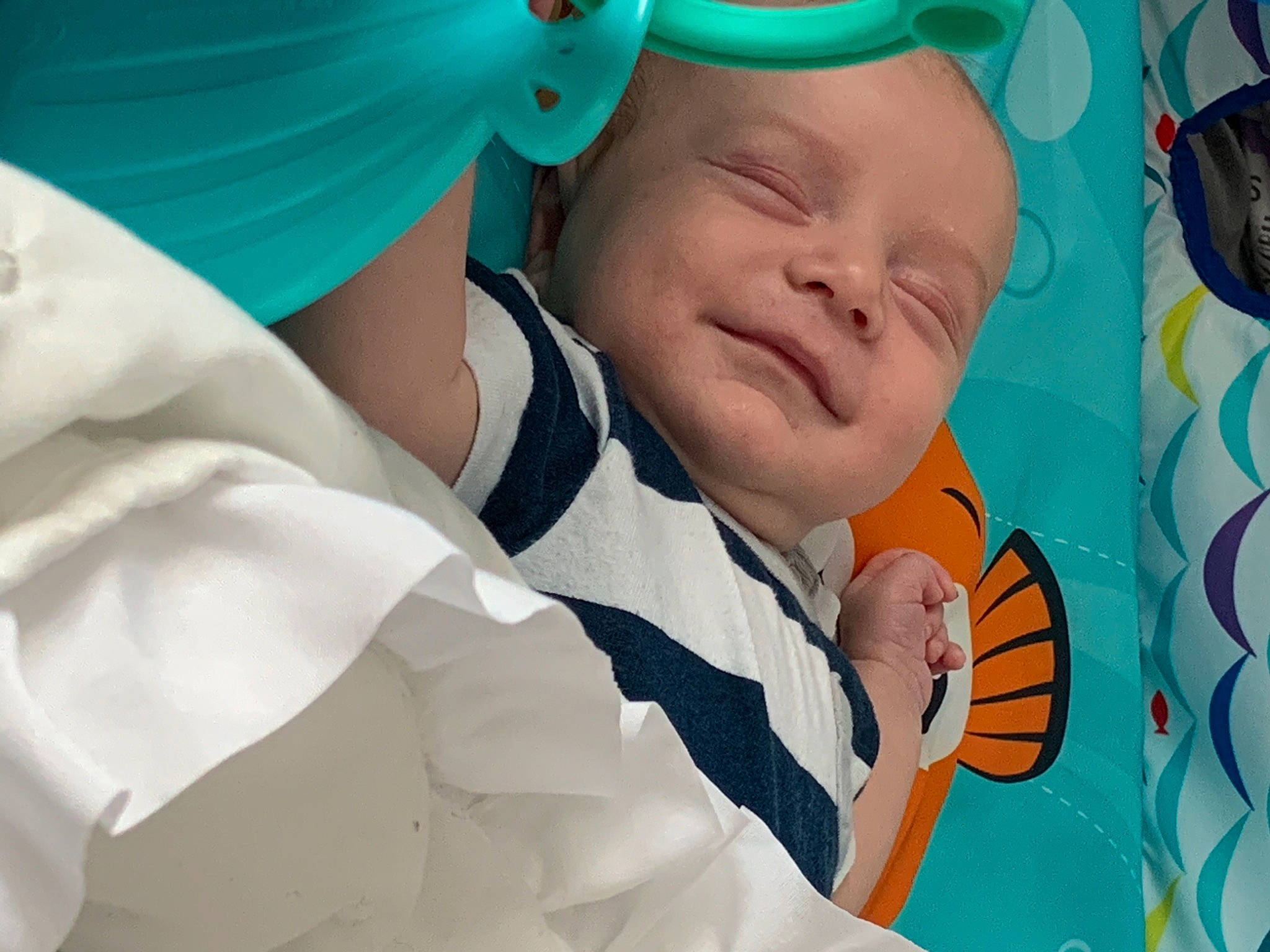 Wyatt joined the competition — help win amazing prizes! baby, baby_products, baby_toddler_clothing, blue, child, event, fun, gesture, green, happy, hat, laugh, linens, mechanical_fan, pattern, person, room, service, smile, toddler