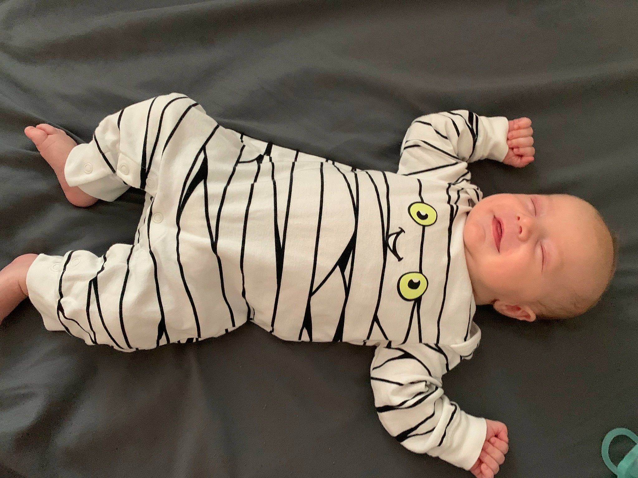 Wyatt joined the competition — help win amazing prizes! baby, baby_toddler_clothing, child, elbow, flooring, font, foot, human_body, joint, mammal, pattern, person, room, sitting, sleeve, sock, t_shirt, toddler, vertebrate, wood