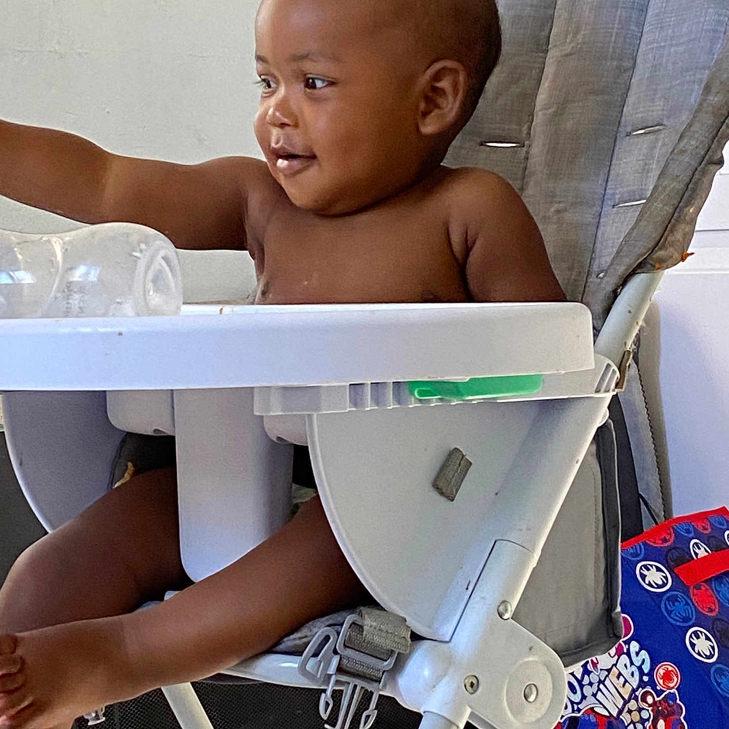 Knowledge is registered to the contest to win money with this photo: baby, babylaughing, chair, face, furniture, happy, head, highchair, person, photography, portrait, sitting