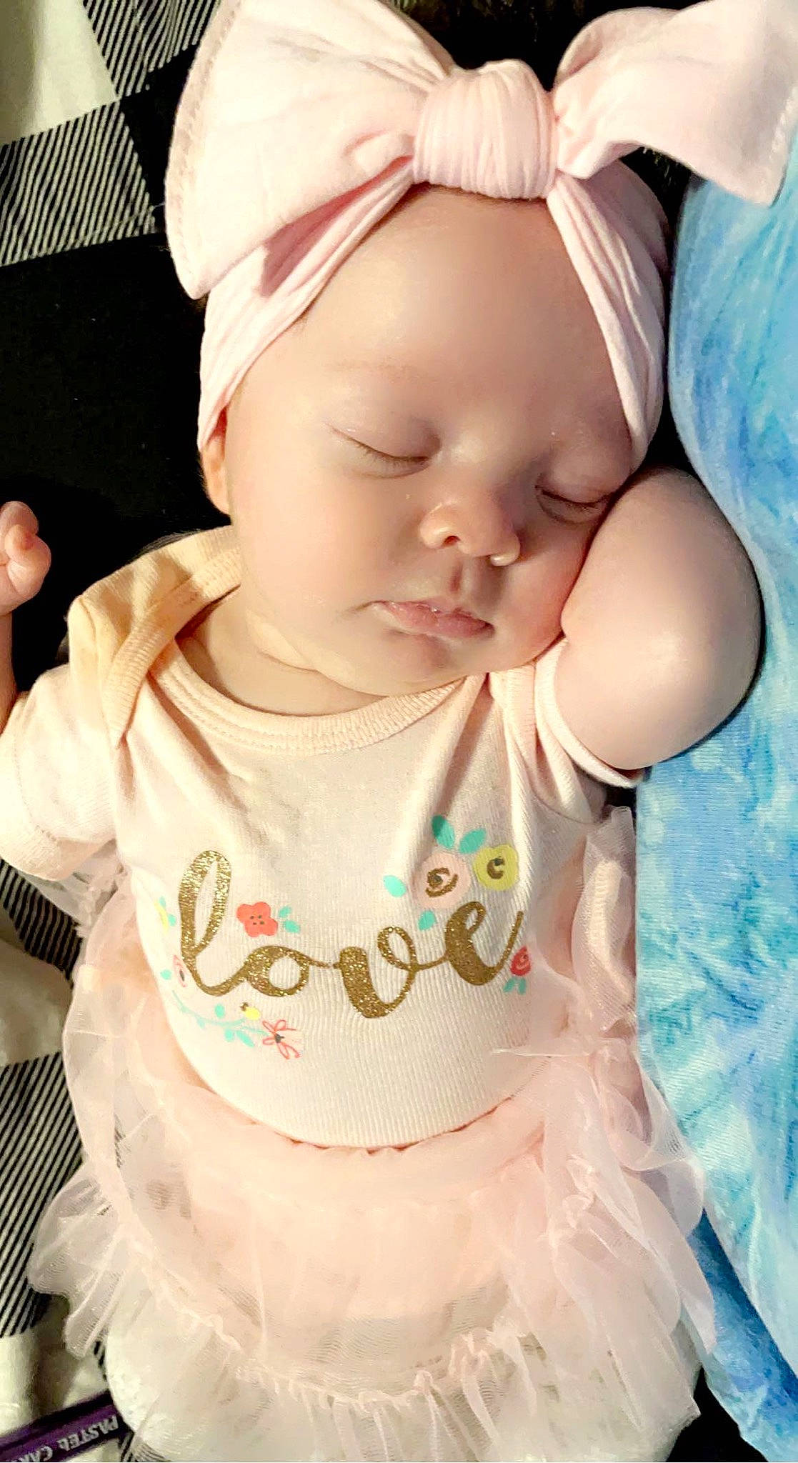 Peyton is registered to the contest to win money with this photo: baby, baby_products, baby_toddler_clothing, beauty, cap, cheek, child, day_dress, eyelash, happy, lip, neck, pattern, person, pink, ruffle, skin, sleeve, textile, toddler