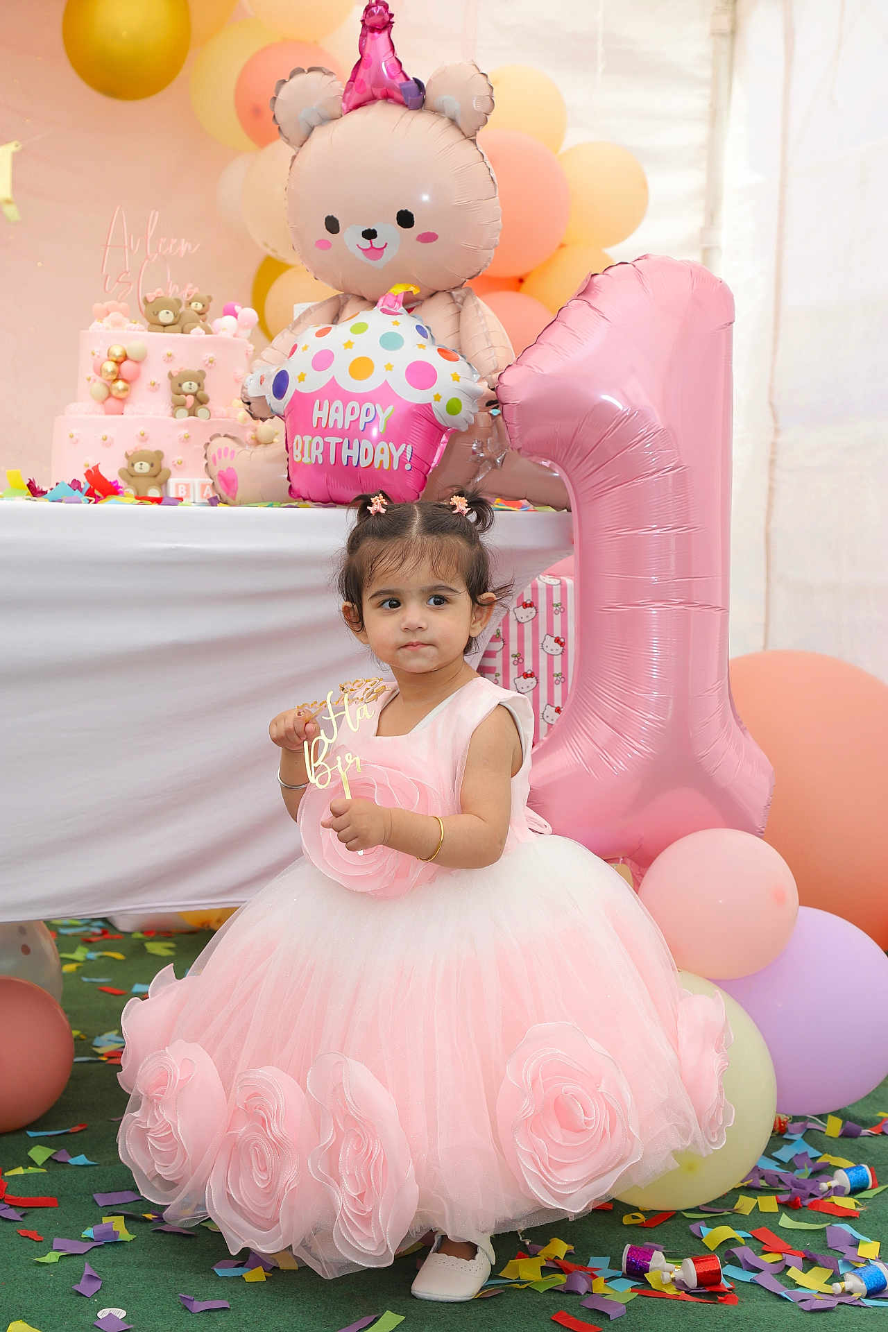 Avleen is registered to the contest to win money with this photo: child, birthday, party, pink_dress, balloons, confetti, celebration, cake, toddler, number_one_balloon, cute, indoor, festive, decorations, gift_box, smile, hair_ties, toy, event, happy