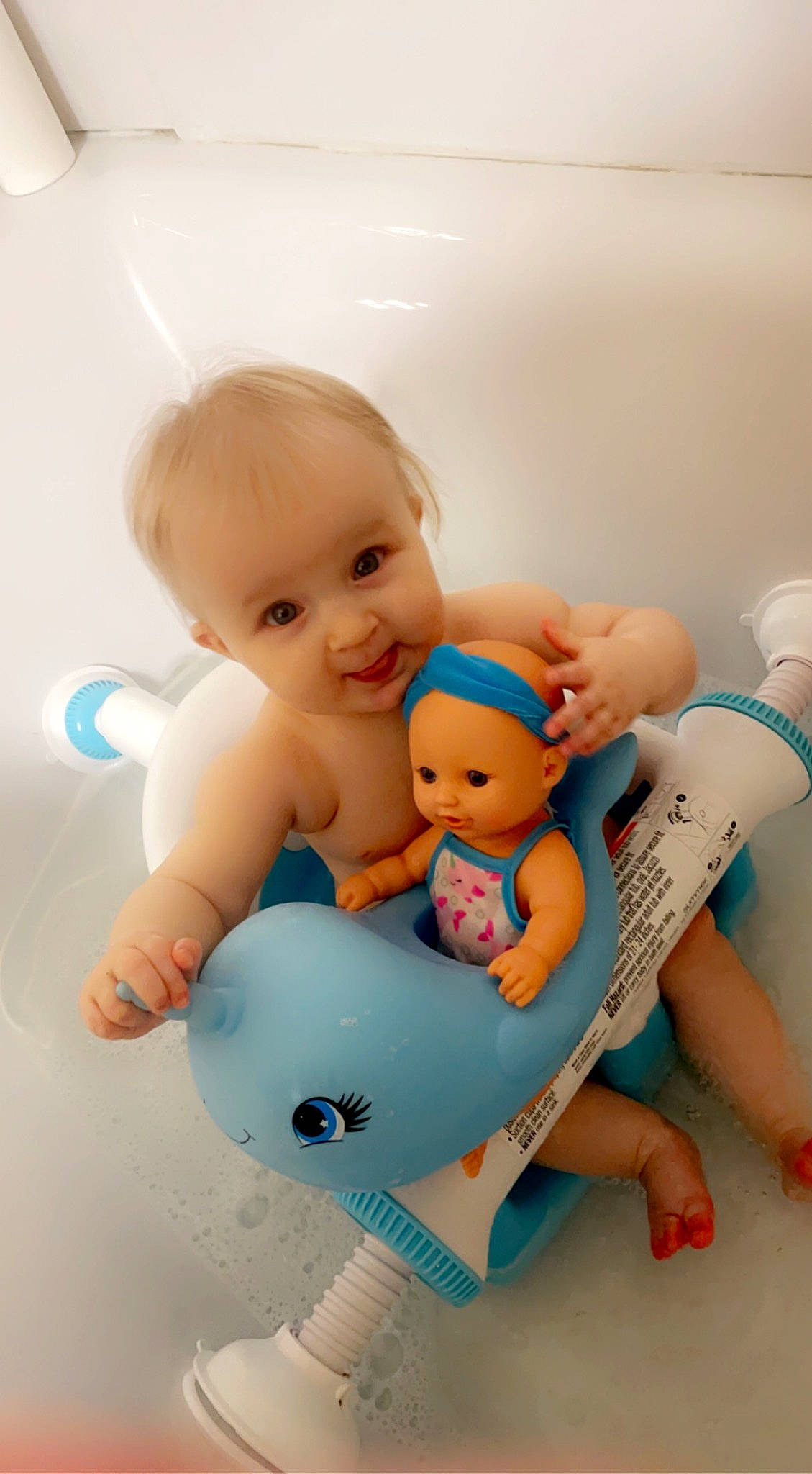 Briella is registered to the contest to win money with this photo: baby, baby_products, baby_safety, baby_toddler_clothing, baby_toys, bath_toy, bathing, child, finger, gesture, happy, person, plastic, product, room, sitting, skin, stomach, thumb, toddler