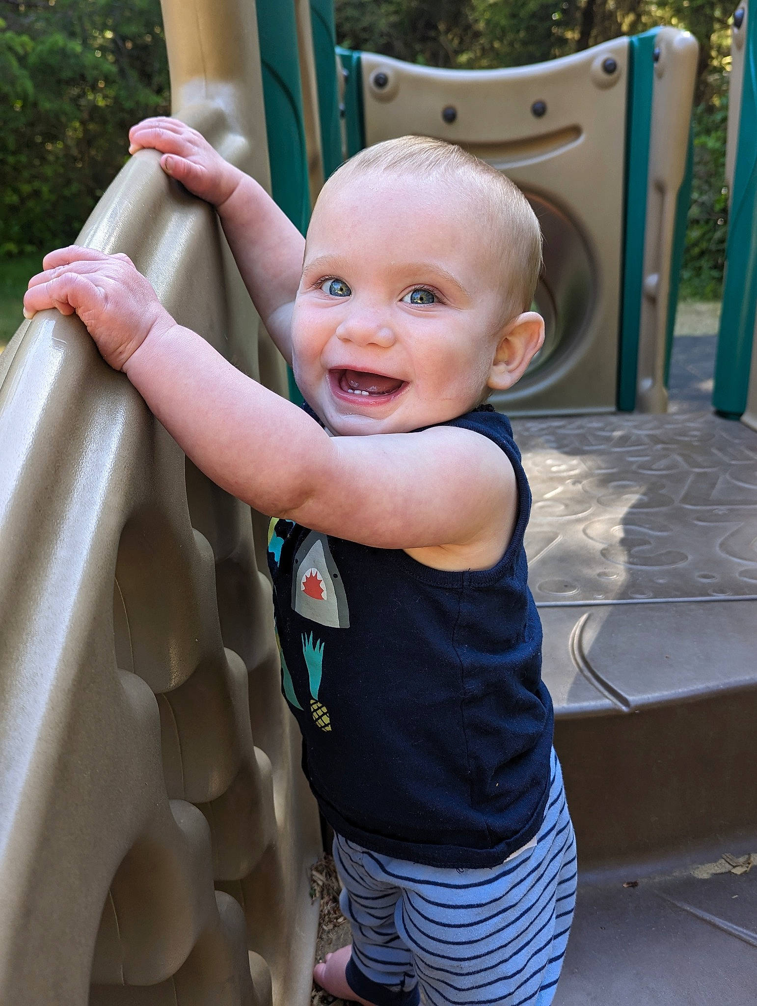 Westley is registered to the contest to win money with this photo: arm, baby, child, fun, gesture, hand, happy, joy, leisure, person, playground, product, recreation, shorts, smile, snapshot, standing, summer, t_shirt, toddler