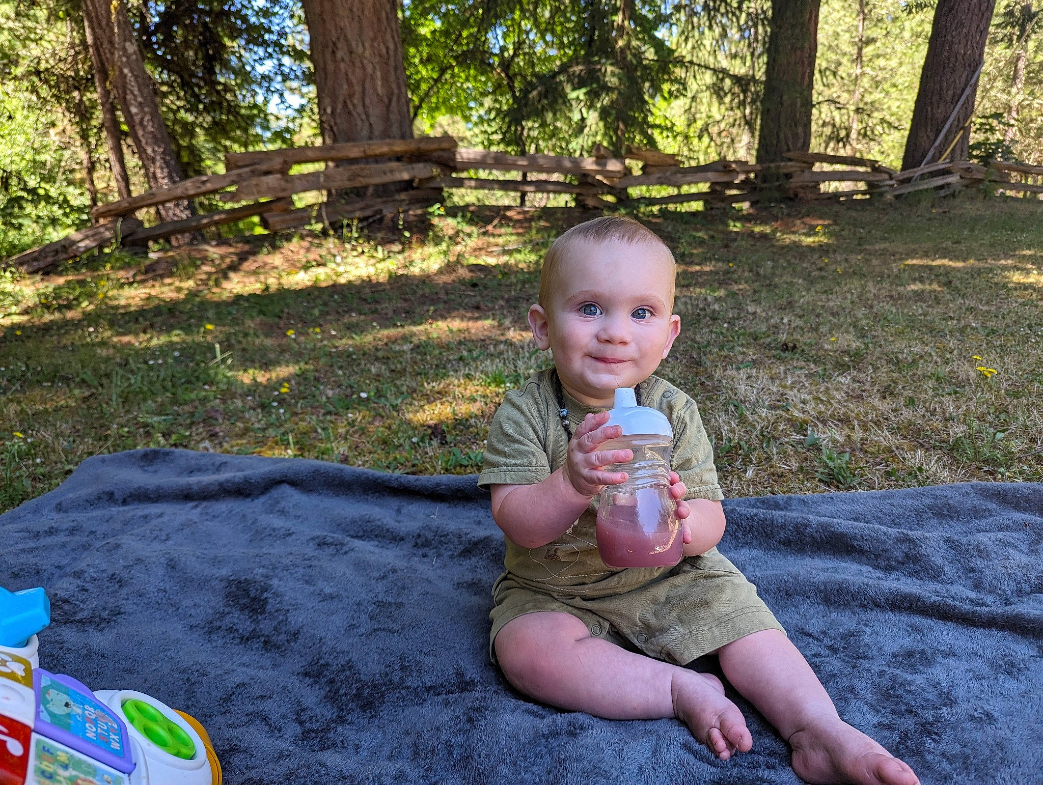 Westley joined the competition — help win amazing prizes! baby, baby_toddler_clothing, barefoot, child, foot, fun, garden, grass, happy, joy, leisure, people_in_nature, person, plant, recreation, sitting, smile, soil, t_shirt, thumb