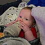 Giovanni joined the competition — help win amazing prizes! baby, bottle, blanket, red_clothing, face, hand, infant, indoors, soft_texture, patterned_blanket, cute, feeding, child, young, comfort, resting, sleepwear, cozy, warm, portrait