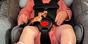 Lila joined the competition — help win amazing prizes! baby, car_seat, child, child_seat, cute, face, feet, foot, head_support, human, indoor, infant, looking, newborn, peach_outfit, safe, seat_belt, sitting, small, straps