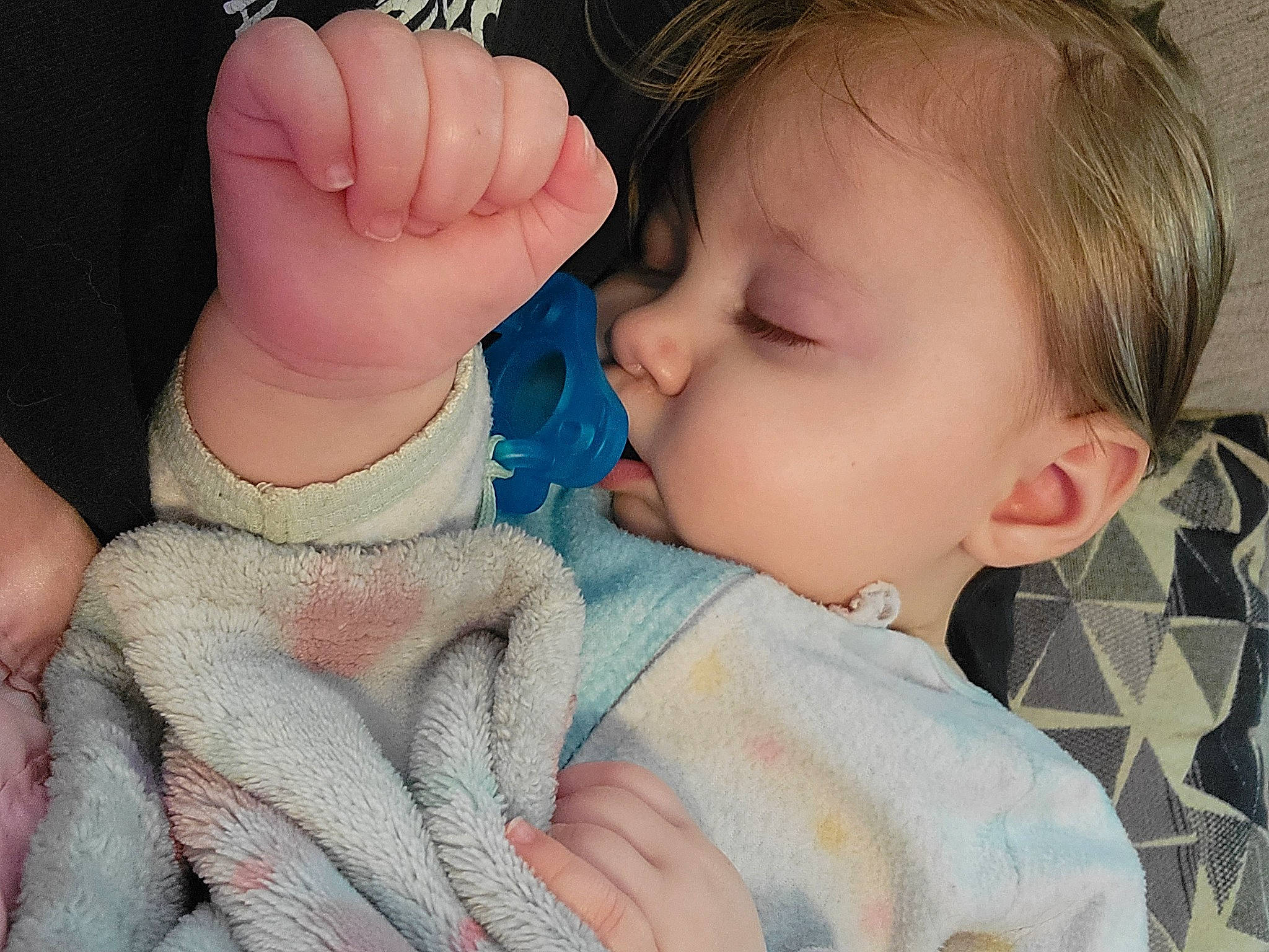 Rin is registered to the contest to win money with this photo: baby, baby_toddler_clothing, cheek, child, comfort, ear, eyelash, gesture, hair, iris, lip, mouth, neck, nose, person, product, skin, sleeve, textile, thumb