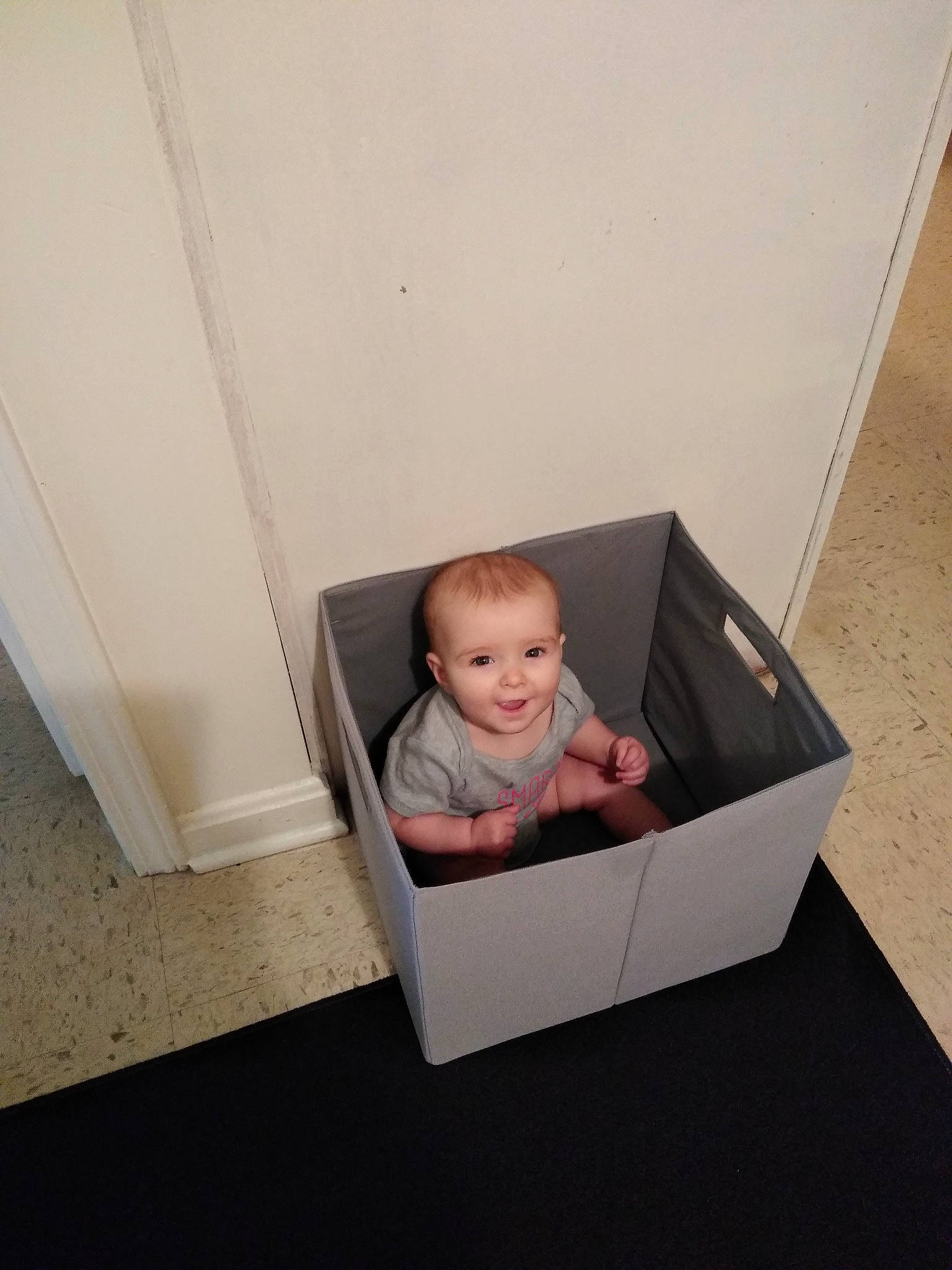 Suzie Belle is registered to the contest to win money with this photo: baby, box, child, person, photography, product, room, toddler
