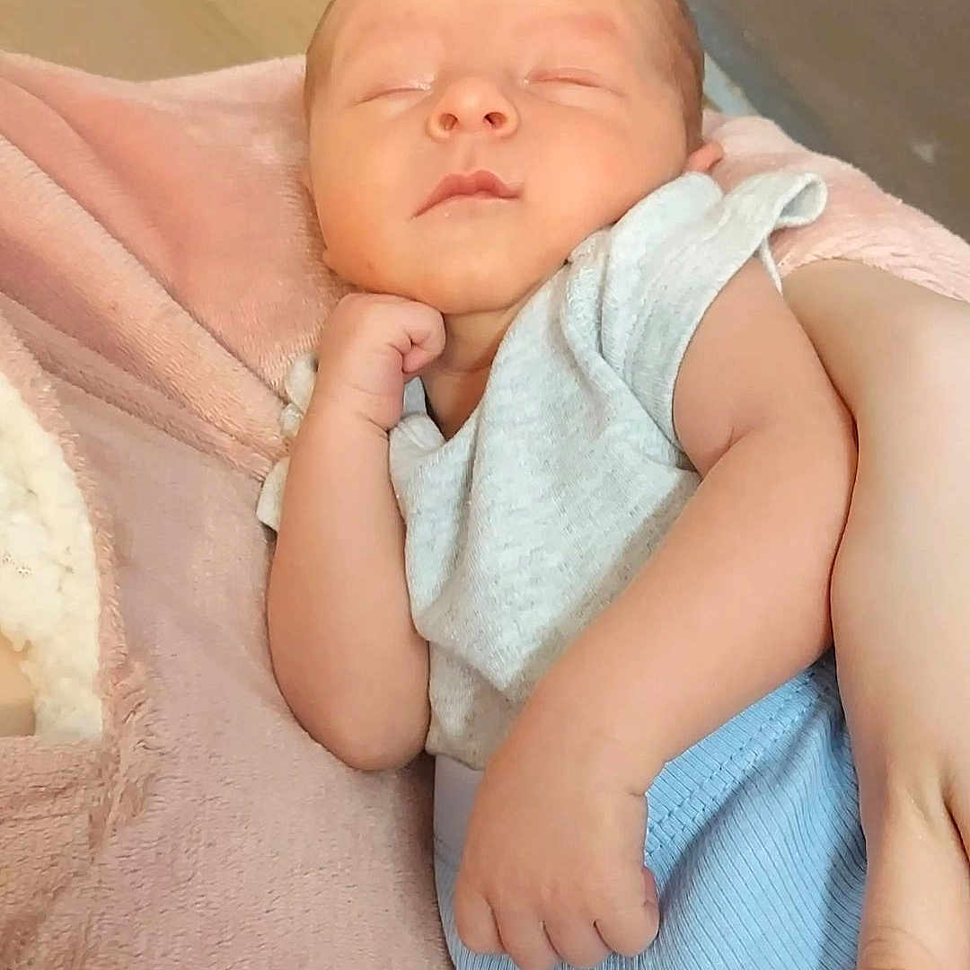 Wyatt joined the competition — help win amazing prizes! architecture, baby, bed, bedroom, blanket, building, clothing, face, furniture, glove, head, indoors, newborn, person, photography, portrait, quilt, room, sleeping, towel