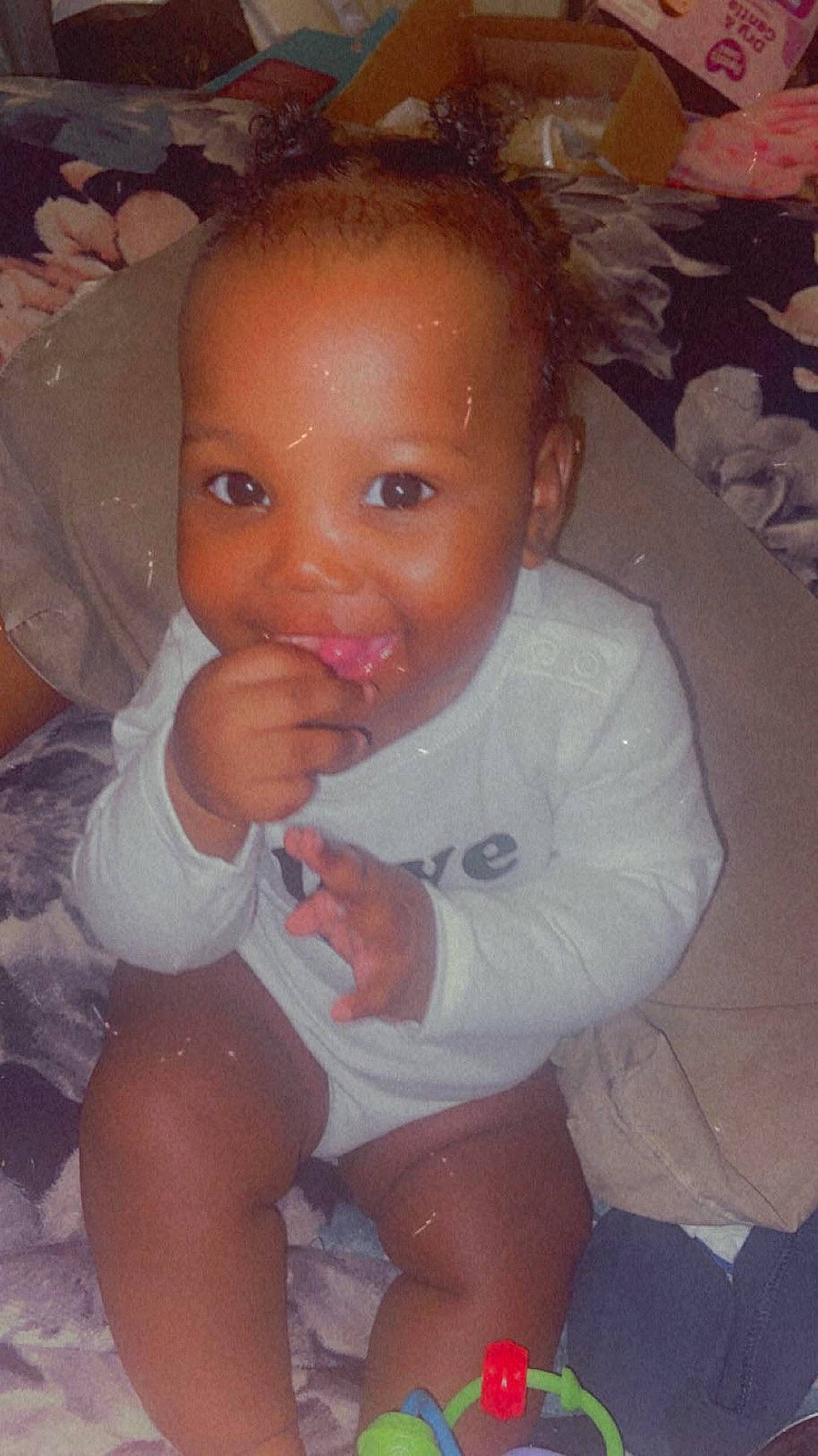 Delilah is registered to the contest to win money with this photo: baby, baby_toddler_clothing, cheek, ear, eye, eyebrow, eyelash, finger, gesture, head, human_body, iris, lip, mouth, neck, nose, person, pink, skin, thumb