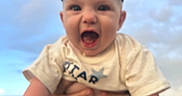 Bentlee Barron is registered to the contest to win money with this photo: baby, cap, child, clouds, cute, expression, fun, hands, happy, hat, infant, outdoor, person, playful, portrait, red_shorts, shirt, sky, smiling, tattoo