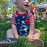 baby, child, grass, outdoor, summer, smiling, happy, blue_sky, trees, park, people, toddler, clothing, footwear, sunlight, nature, casual, sitting, portrait, daytime