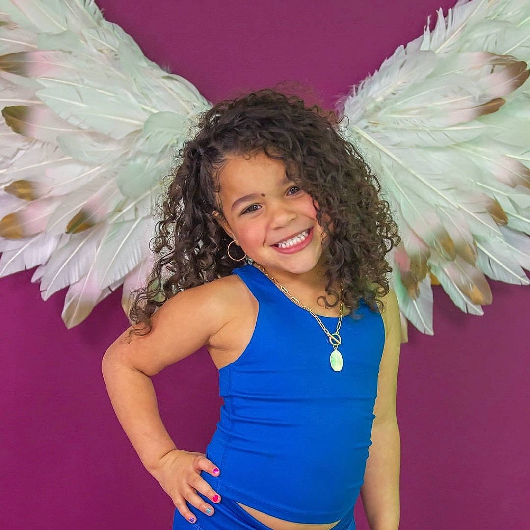 Royce is registered to the contest to win money with this photo: azure, electric_blue, event, fashion, fashion_design, feather, fun, hair, hairstyle, happy, headpiece, jewellery, joy, magenta, person, pink, shoulder, smile, standing, textile