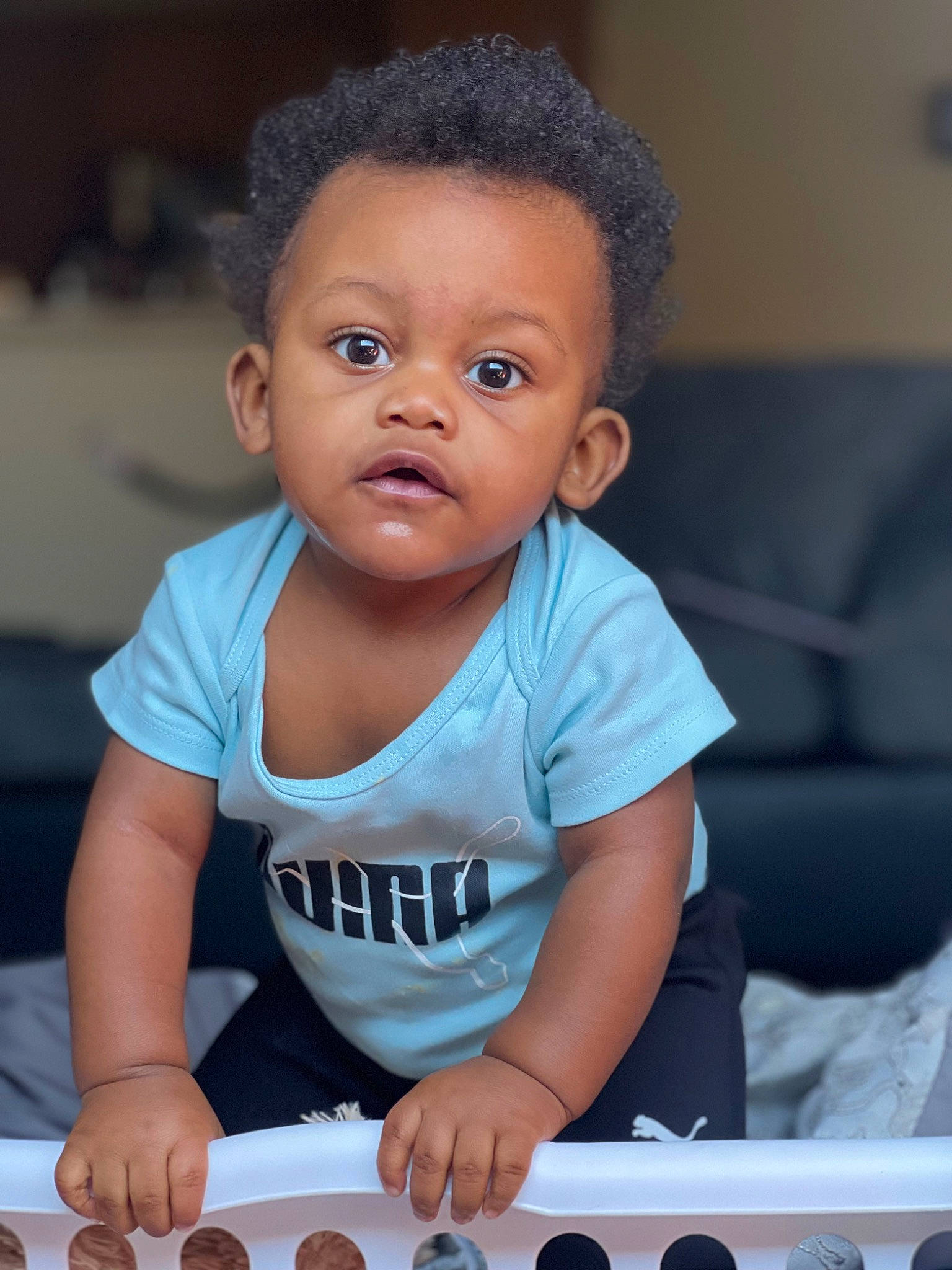 Junior joined the competition — help win amazing prizes! baby, baby_toddler_clothing, beauty, black, cheek, child, chin, couch, finger, fun, happy, human, nail, nose, person, sitting, skin, smile, snapshot, t_shirt