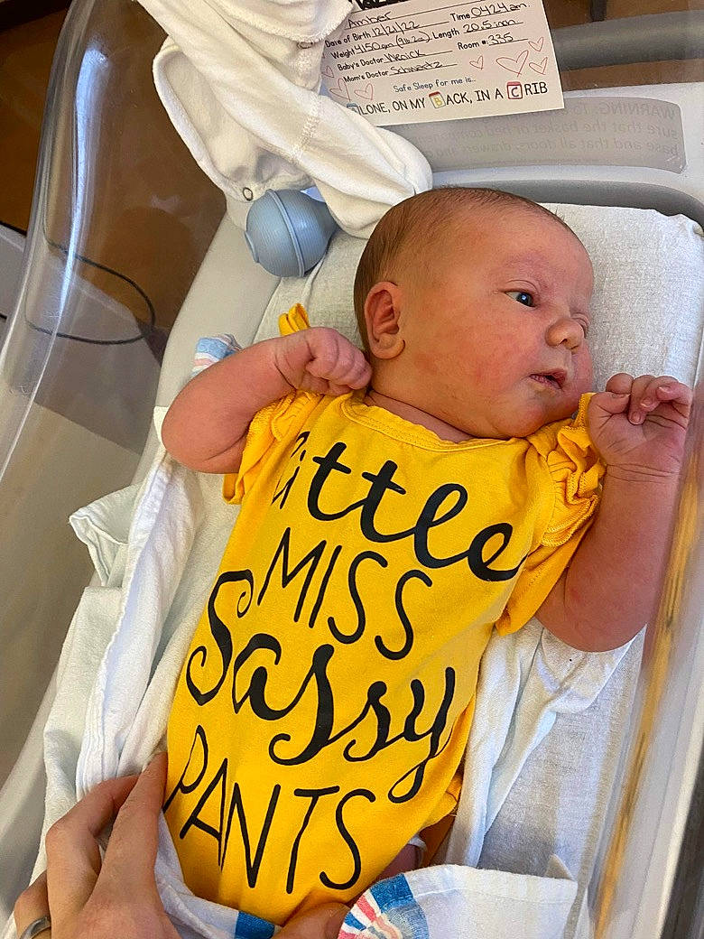 Madelyn joined the competition — help win amazing prizes! art, baby, baby_products, baby_toddler_clothing, car_seat, chair, child, comfort, finger, happy, illustration, linens, pattern, person, room, sitting, t_shirt, textile, thumb, toddler