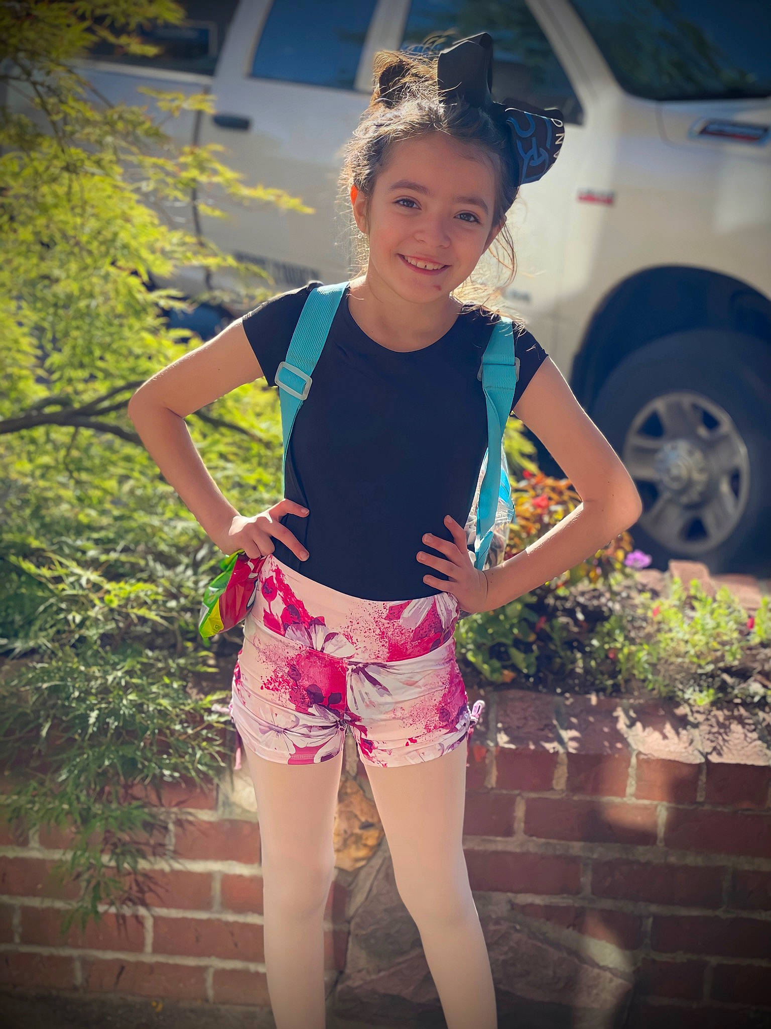 Olyve joined the competition — help win amazing prizes! blue, car, electric_blue, grass, happy, head, jean_short, joy, leisure, person, pink, plant, shorts, sleeve, summer, t_shirt, thigh, tints_and_shades, tire, trunk