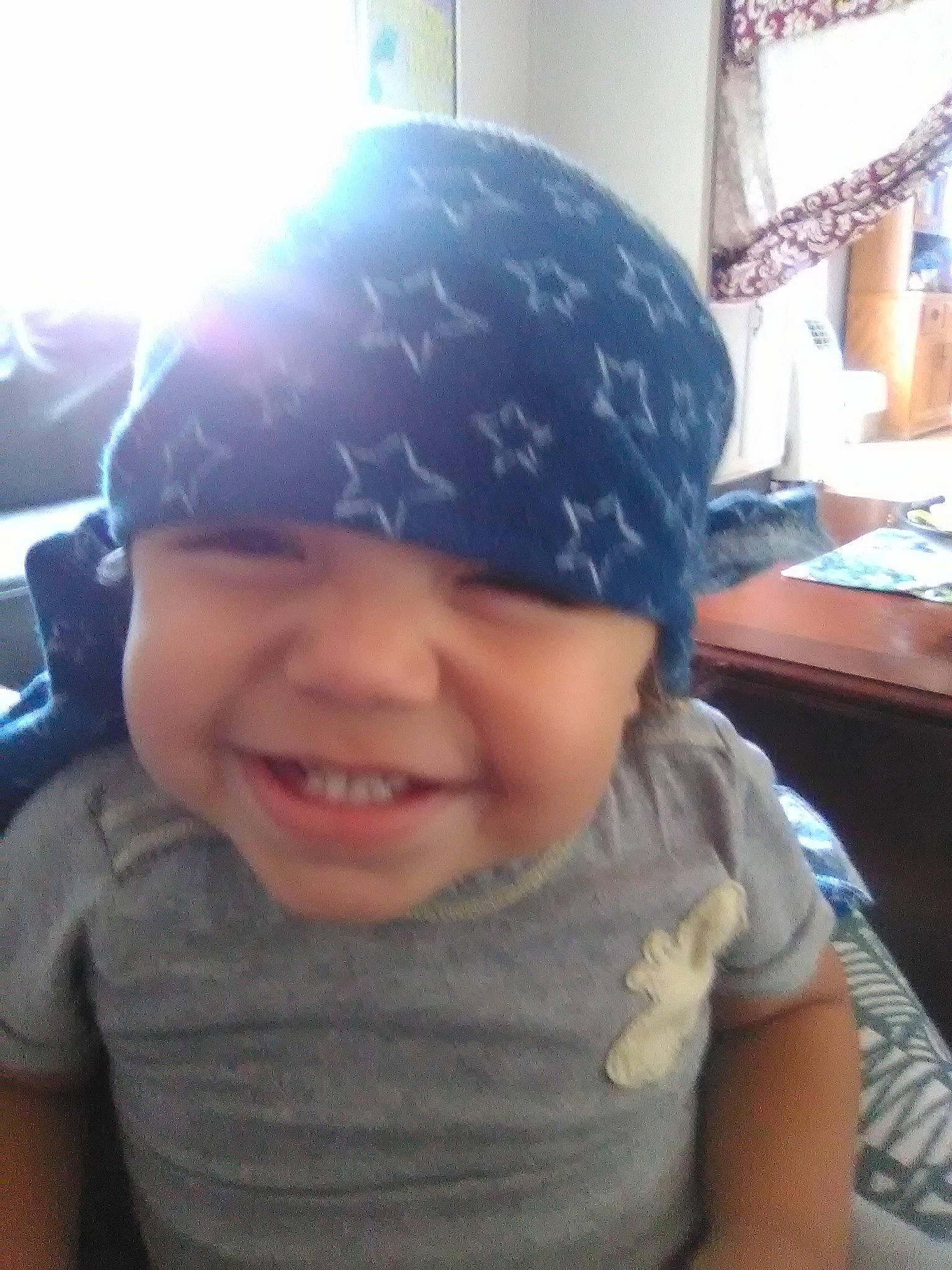 Javin is registered to the contest to win money with this photo: baby, beanie, bonnet, cap, child, clothing, cool, forehead, hat, head, headgear, joy, knit_cap, person, selfie, smile, toddler