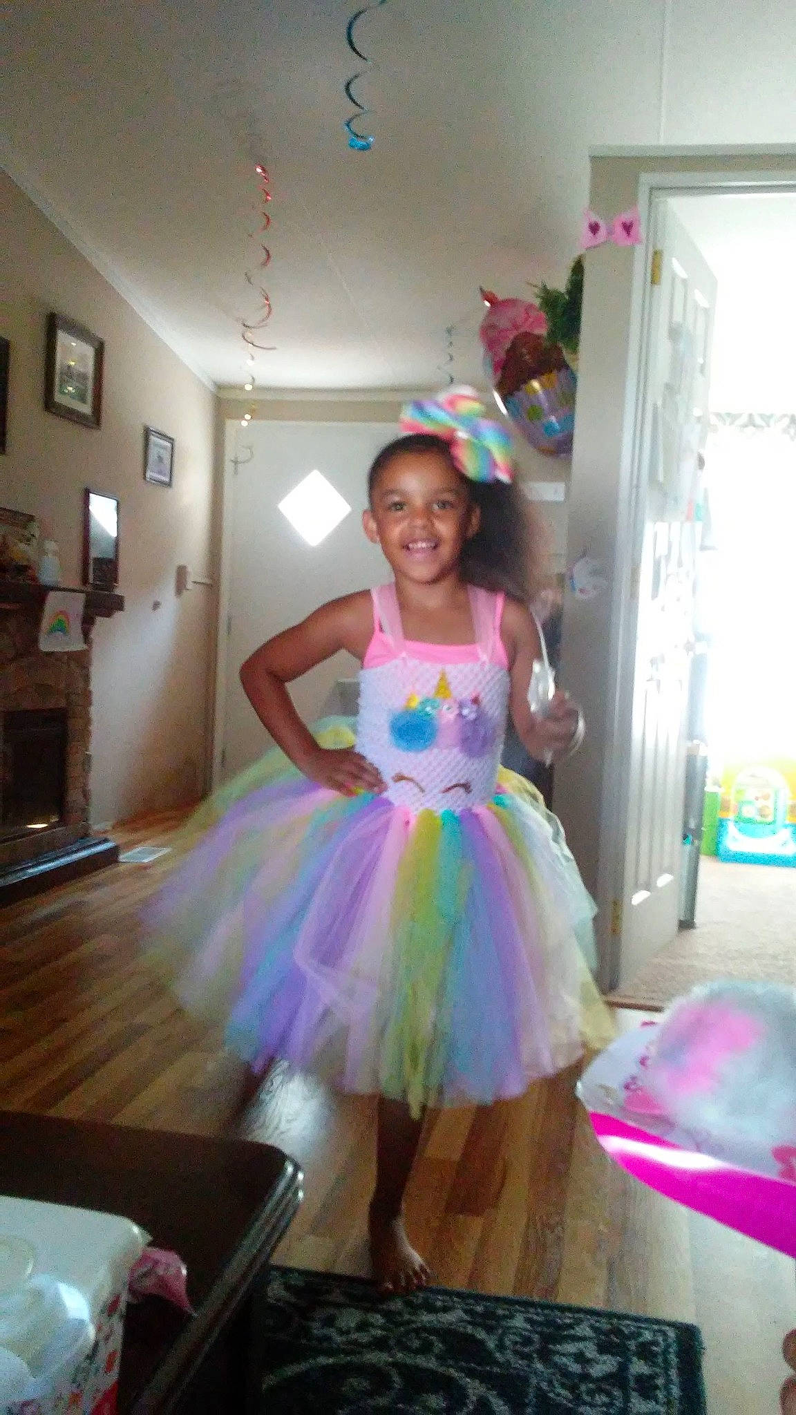 Makenna is registered to the contest to win money with this photo: ballet_tutu, clothing, costume, dress, joy, person, pink, room