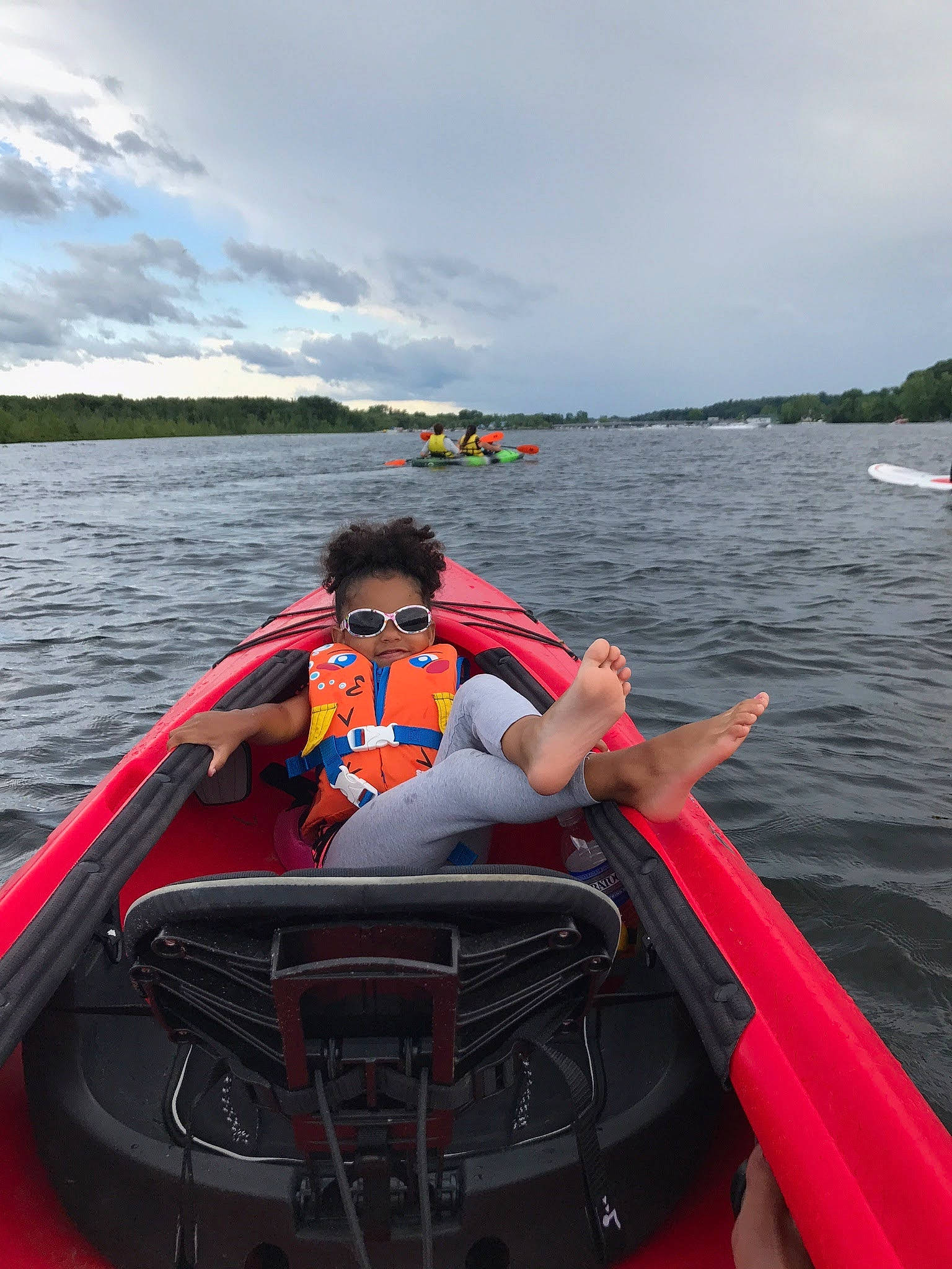Makenna joined the competition — help win amazing prizes! boat, boating, boats_and_boating_equipment_and_supplies, canoeing, fun, headwear, kayak, kayaking, lake, leisure, lifejacket, oar, outdoor_recreation, person, personal_protective_equipment, recreation, vacation, vehicle, water_sport, water_transportation