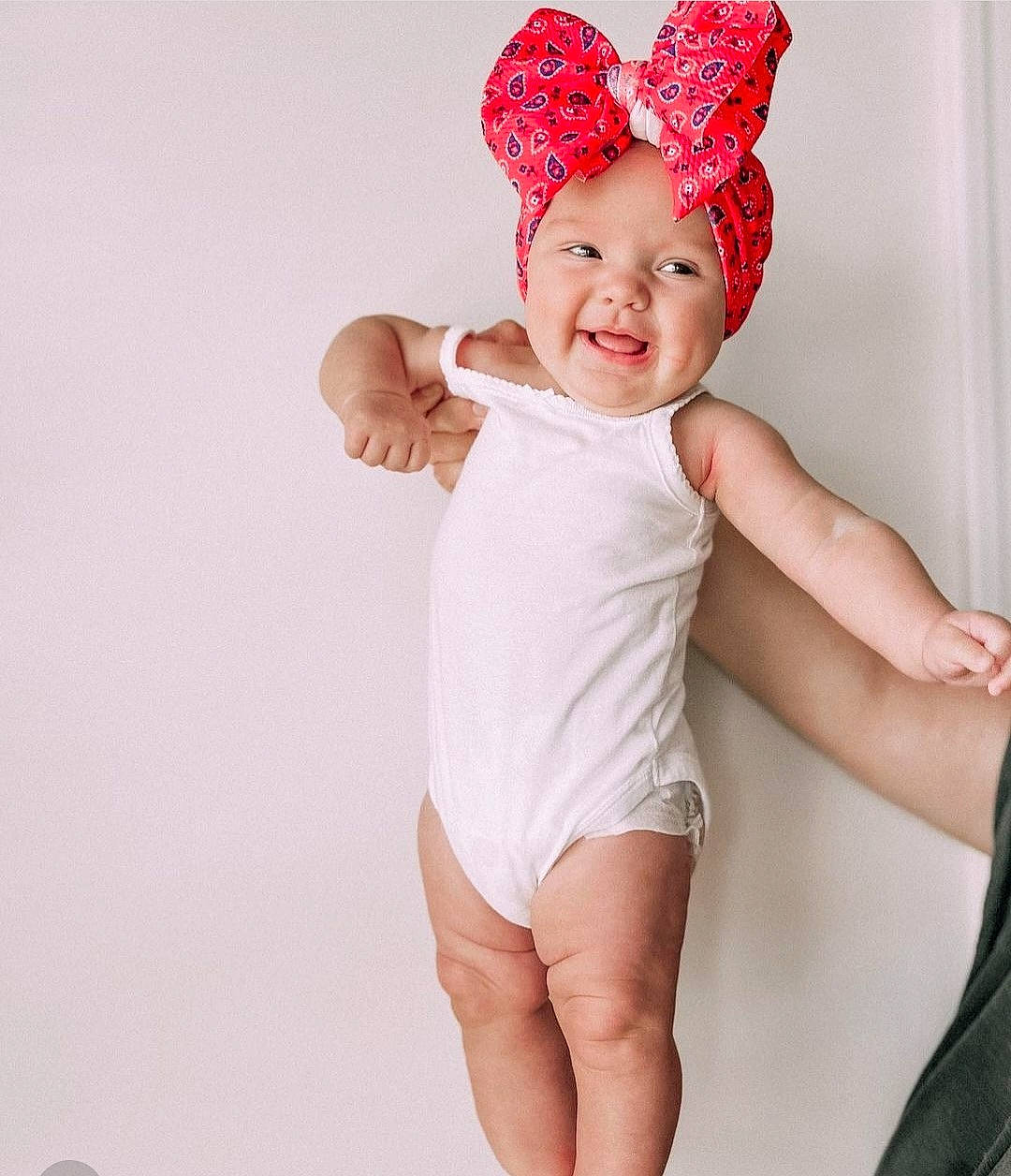 June joined the competition — help win amazing prizes! baby, baby_toddler_clothing, chest, child, elbow, face, fashion_accessory, finger, gesture, happy, headgear, headwear, human_body, human_leg, pattern, person, sleeve, smile, stomach, thigh
