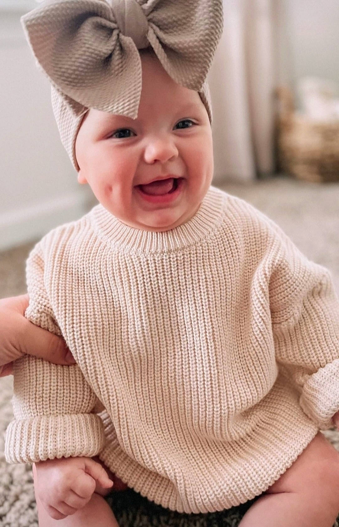 June joined the competition — help win amazing prizes! baby, baby_toddler_clothing, cap, child, dress, face, facial_expression, finger, happy, head, joy, outerwear, people, person, photograph, pink, skin, sleeve, smile, textile
