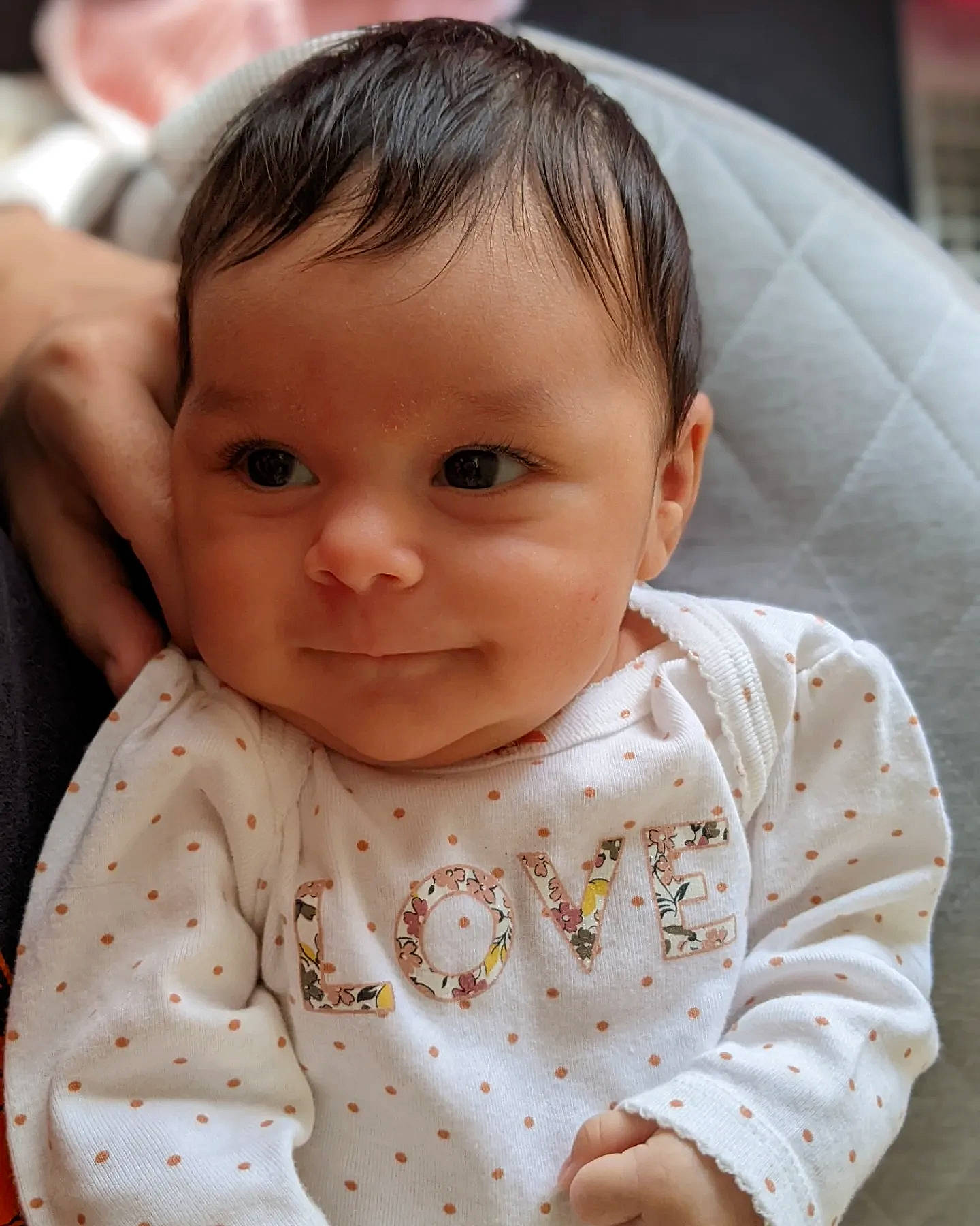 Leila is registered to the contest to win money with this photo: baby, baby_toddler_clothing, cheek, child, chin, collar, comfort, eyebrow, eyelash, facial_expression, happy, iris, lip, neck, nose, people, person, product, skin, sleeve