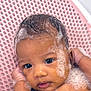 baby, bath, bubbles, foam, water, pink_tub, wet_hair, cute, infant, face, skin, hand, relaxing, child, portrait, closeup, sitting, indoors, cleaning, personal_care