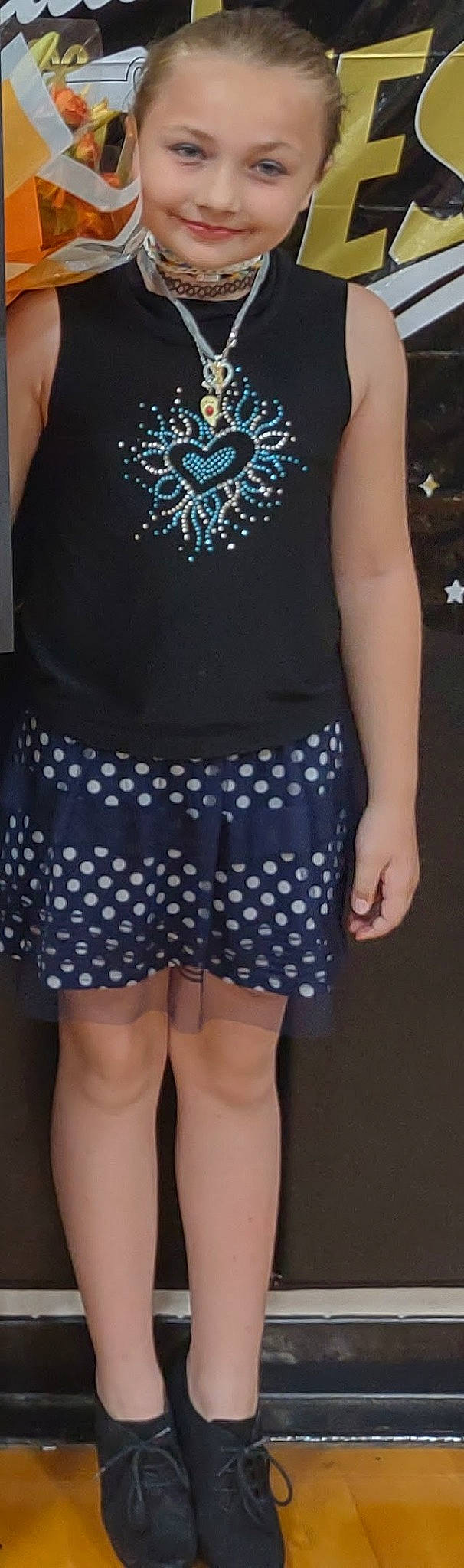 Hailey is registered to the contest to win money with this photo: day_dress, electric_blue, fashion_design, human_body, joint, joy, knee, neck, outerwear, pattern, person, plaid, shorts, sleeve, sportswear, style, t_shirt, tartan, textile, thigh