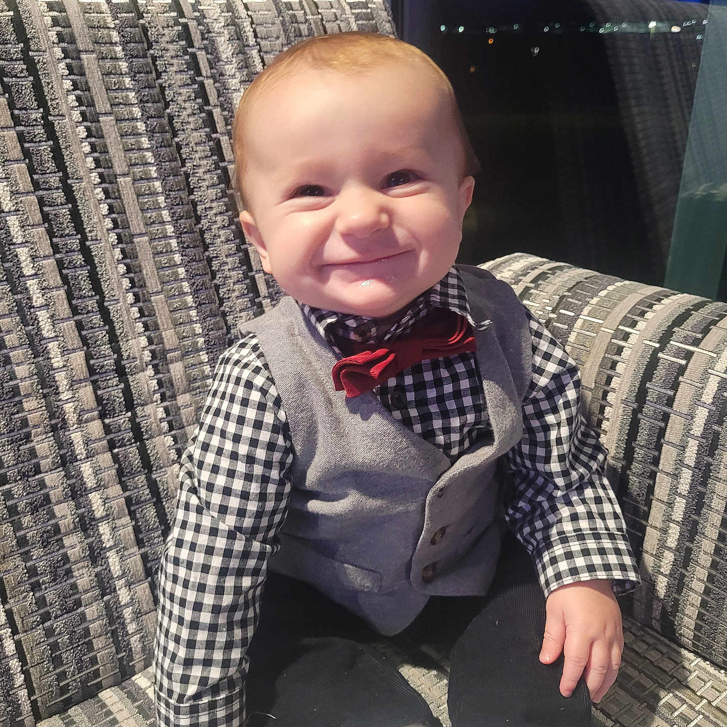 Michael joined the competition — help win amazing prizes! accessories, baby, blazer, clothing, coat, couch, cushion, face, formalwear, furniture, happy, head, homedecor, jacket, pants, person, photography, portrait, sitting, tie