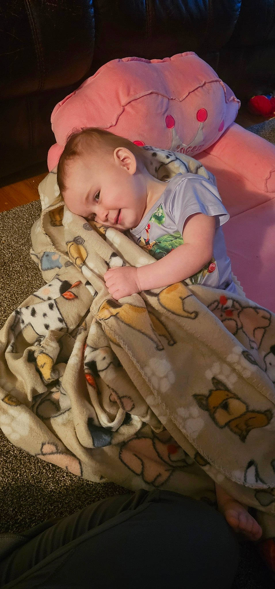 Brooklyn is registered to the contest to win money with this photo: baby, baby_products, baby_safety, baby_toddler_clothing, bedtime, cheek, child, comfort, flooring, fun, grass, head, linens, military_camouflage, pattern, person, sitting, skin, sleeve, t_shirt