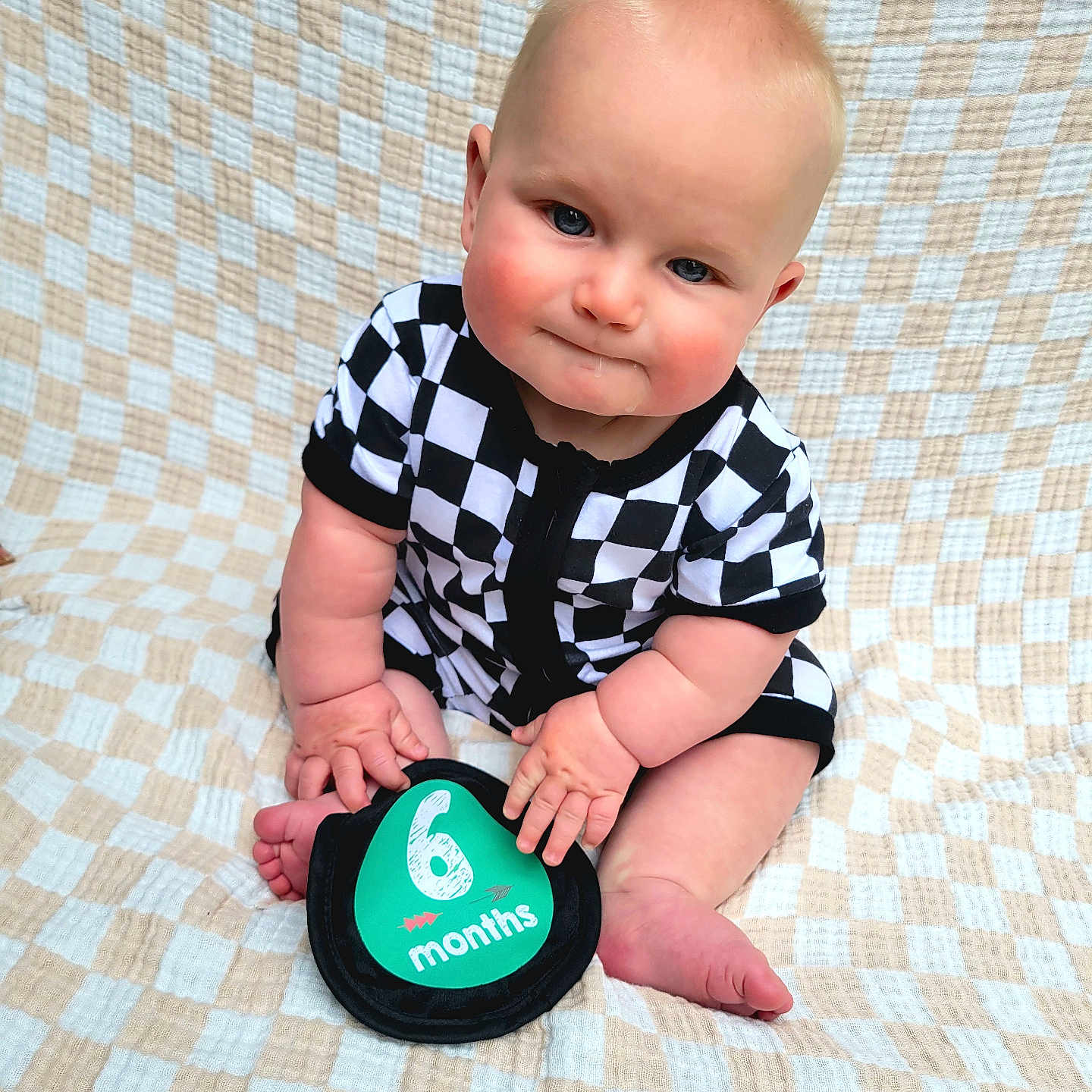 Brody is registered to the contest to win money with this photo: americanfootball, americanfootballball, baby, ball, bodypart, cameralens, electronics, face, finger, football, hand, happy, head, lenscap, person, photography, portrait, sitting, sport, toy