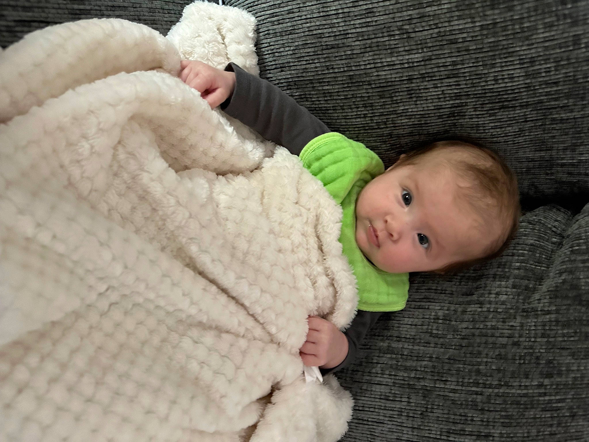 Luna is registered to the contest to win money with this photo: baby, baby_sleeping, baby_toddler_clothing, cheek, child, comfort, creative_arts, fur, grass, knit_cap, knitting, linens, pattern, person, skin, sleeve, thumb, toddler, wood, wool